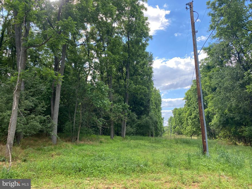 Amazing 2.61 acre UNRESTRICTED lot in rural Harpers Ferry.  This lot is ready to build on.  With a well and septic approved, a house site chosen...all you need is your dream home's floorplans.  The current owners are custom builders and will build for you.  They do have some house plans to share if you would like. This great lot has seasonal mountain and pastural views.  Come see how this lot can help your new construction home dream come true.
