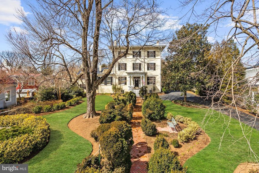 Unique opportunity to buy a Historic Landmark in Leesburg's Historic District:  (2)-Estates, (3)-Residences, (2)-Out-Buildings, (6)-Garage Spaces & (14)-Parking Spaces on Rare (1)-Block-Deep Lot (1+Acre) w/In-Law Suites, Executive Offices & (2)-Conference RMs.  Two Addresses: 205 N. King ST (Glenfiddich House) & 206 Wirt ST NW (Carriage House & Stables) in close proximity to King ST Shopping, Loudoun County Gov, Courthouse & Future Courthouse Square (110,500 SQFT of Offices, Retail, Restaurants).  Live & work in Downtown Leesburg, Ranked 12th on the "2019 Best Small Cities in America" out of 1,200+ Cities Across the U.S.   Two Estates w/10,550 SQFT (estimate) that combines Residential & Commercial-Use w/an Educational Component houses the Miles LeHane Companies (Strategic Talent Management Center & Coaching Career Transition).  The Miles LeHane Companies may be For Sale separately.  The Glenfiddich House is on:  The National Register of Historic Places Unencumbered by Current Historic Restoration Taxes;  Tax Zoned Residential & Approved for Dual Zoning (substantial savings over Commercial Real-Estate & Lower Rates for Conventional Residential Mortgages);  Pass-Through Business & Residential Zoning w/NO State Sales Taxes for the Miles LeHane Companies;  Priority (1) Electric Grid providing Top Priority during Power Failures & (2)-Whole House Generators providing backup.  Text Amendment pending permiting 205 N. King ST & 206 Wirt ST along w/off-street parking to be used as a B&B Facility; may support up-to 15-Potential B&B Units.  Stately (4)-Story Colonial built in the Italianate Style between 1840-1860 w/6,743 SQFT sits high above & far back from N. King ST overlooking expansive well landscaped lawn, w/Boxwoods & Linden Trees.  The interior retains many original features:  Pinewood Floors, Crown Moldings, Glass-Blown Windows, Floor-To-Ceiling Pocket Doors, (12)-Fireplaces & Tiger Wood Maple Staircase. Grand Foyer leads to Spacious Office, light-filled Formal Parlor & Elegant Dining RM (meeting place for General Lee in planning The Battle of Antietam) w/Modern Kitchen & Large Pantry.  The 2nd & 3rd Floors have (4)-well-proportioned Bedrooms & (4)-additional Bedrooms/Offices.  Hallway in Main House connects to oldest part of The Glenfiddich House an Original Log Cabin built in 1767.  This (2)-story brick structure has Family RM w/Wood Burning Stove nestled into Fireplace creating a comfortable gathering place & 2nd Story has (2)-Beds/Full Bath. Rear of Main House lies private gardens, large Brick Patio/Walkway to Carriage House & Stables.  Exteriors constructed to pay architectural homage to The Glenfiddich House & interiors offer Modern Residential Living & Corporate-Use. The Carriage House built in 2001 as Single Family House on (3)-Levels w/2,550 SQFT (estimate) w/Gated Courtyard, Hot-Tub, Gas Lamps & Detached Finished (2)-Garage Spaces w/750 SQFT & Electric Panel to Plug-In Hybrid charging. Main-Level has Gourmet Chefs Kitchen, w/(2)-Viking Ranges, (8)-Gas Burner Professional Range, (6)-Burner Electric Stove, Advantium Oven, Microwave/Convention Oven, Wine Cooler & Bosh Dishwasher. Extended Granite Bar-Counter, Powder RM & Din/Liv RM leading to Covered Porch w/views of manicured landscaped grounds. Upper-Level has 2-Beds/2-Baths: Master BedRM Suite w/Luxury Bath & Roman Shower, Granite Countertops & Balcony w/stunning views of grounds w/a 2nd Bed/Bath & Laundry RM. Lower-Level has (2)-Legal Beds, Full Bath & Mechanical RM: w/Furnace, Water Filtration, Central Vacuum & Water Booster Systems. The Stables built in 2004 as Single Family Residence on (2)-Levels w/2,900 SQFT (estimate). Main-Level has (4)-Finished Garages w/1,450 SQFT w/HVAC, Wash Station, Washer/Dryer, Water Filtration, Central Vacuum, Water Booster Systems & (2)-Porches. Upper-Level has (2)-Conference RMs w/1,450 SQFT, Kitchen, (2)-Baths & (2)-Balconies; can be converted into (2)-Condos or (2)-In-Law Suites.