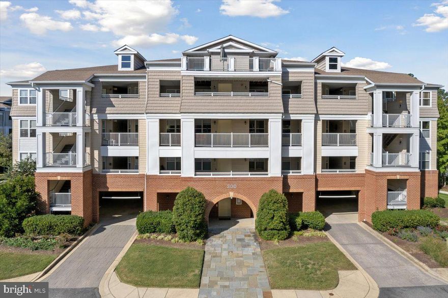 MOVE IN READY!! Beautifully maintained single level condo offers serene views of the community pond with fountain, and a bright airy feeling throughout the space. This unit features brand new luxury vinyl plank flooring in the living and dining room, new carpet in the bedrooms. Enjoy the convenience of two covered parking spaces, a rare and valuable feature that adds ease to your lifestyle year-round.  Oyster Bay is located 75 minutes from Capito Hill and offers exceptional amenities, including a large outdoor pool, tennis/pickleball courts, a well-appointed clubhouse, and a kayak launch that provides easy access to the surrounding waterways—ideal for nature lovers and outdoor enthusiasts. Located just minutes from downtown Solomons, you'll have quick access to waterfront dining, local shops, marinas, and cultural attractions—all while enjoying the privacy and tranquility of this sought-after community. Whether you're looking for a full-time residence or a weekend getaway, you'll appreciate the low-maintenance living and the peaceful, friendly atmosphere Oyster Bay is known for. Enjoy quiet mornings on your private balcony overlooking the pond, then spend the afternoon paddling along the creek, relaxing by the pool, or playing a match on the courts.