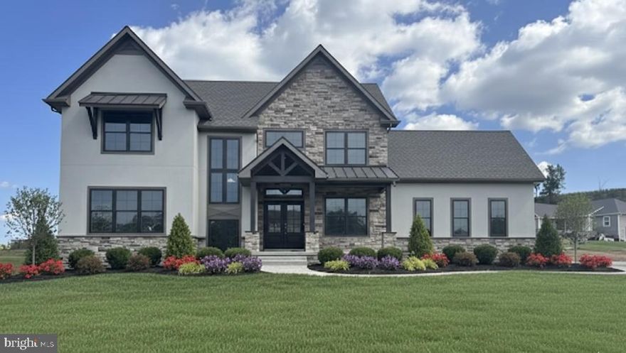 Check out S. Gerald Musser Builder’s latest model home, the “Laurel.” This stunning 3,024-square-foot, two-story home is packed with impressive features. It offers 4 bedrooms, 3 ½ bathrooms, 3 fireplaces, a full basement with poured concrete walls, and a two-car side-load garage. It also has an unfinished bonus room over the garage for storage or we can finish it for a 5th bedroom or office whichever meets your needs.
The first-floor primary suite is a true retreat, complete with an electric fireplace, a luxurious bathroom featuring ceramic tile floors, a walk-in shower, a soaking tub, and two spacious walk-in closets. There's also a second-floor primary suite with its own attached bath, a whirlpool tub, ceramic tile walk-in shower, and a walk-in closet. For cozy nights, the second-floor loft boasts a gas fireplace.
The first floor is highlighted by 9-foot ceilings, a family room with vaulted ceilings and exposed beams, and a gas fireplace that leads to the rear stamped concrete patio. Just off the foyer, a study with double French doors and a striking stone accent wall offers a perfect space to work or relax.
And then there’s the kitchen—truly a showstopper. With custom cabinetry, sleek Quartz countertops, and premium Café’ appliances, it’s designed for both style and function. Come see it for yourself—you won’t be disappointed! This model home is a representation of what can be built - not currently for sale. Taxes are estimated.