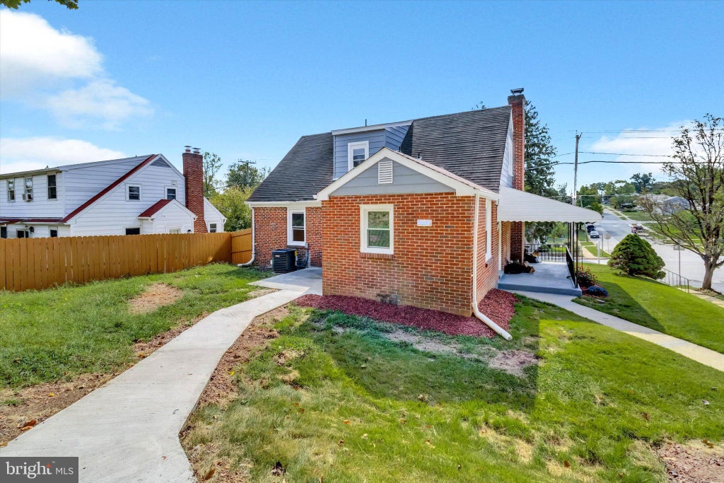 Photo of 574 Edmondson Ave, BALTIMORE, MD 21228 (MLS # MDBC2176088)