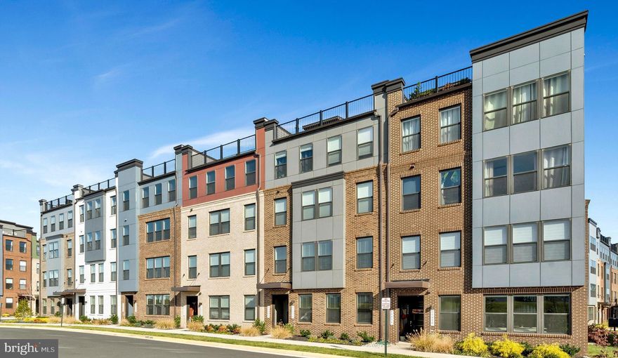 Gorgeous 2-level townhome style condo in highly sought-after Ashbrook Place! Main level offers an open concept floorplan with gleaming hardwoods, tons of light, spacious living & dining areas, and a powder room. The gourmet kitchen is an entertainer’s dream with a large island, quartz counters, huge pantry and top of the line appliances. Upstairs you will find an additional living area with a balcony perfect for a home office, media/gaming space, or playroom. The primary suite offers a wall of windows, two very large closets with one adjoining the spa-like bath. A second generously sized bedroom and bath complete the second level. The property also features a rear entry one car garage with private driveway. Additional amenities include ample unreserved parking, common area, dog park, and access to trails. In the shadow of One Loudoun you’re close to upscale shopping, dining and entertainment! Minutes to the Dulles 28 Tech Corridor, Dulles International airport, Metro, and DC!