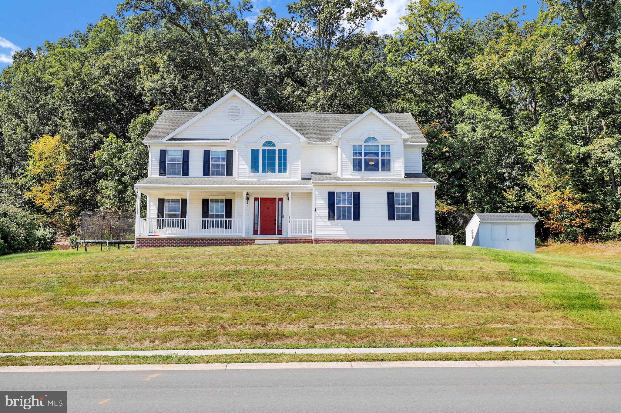 Every so often a home comes to market that just steals the spotlight from all others. This is one of those homes. From its stately position on its 1 acre lot, you can park next to the side loaded, 2 car garage. The home invites you to enter the two story foyer with light and airiness as you walk past the updated powder room to the expansive kitchen complete with center island, updated appliances, granite counters, and a large dining area. Brand new, stunning porcelain flooring on the main level and carpeting upstairs just adds to the opulence of the home's experience. The family room, with its gas fireplace and location off the kitchen, allows for inclusion and warmth. There is a peaceful living room that leads to a private office with built in granite topped desks . Enjoy the tranquility of the private, fully fenced yard. The mudroom leads to the garage. Upstairs, the huge owner's suite will take your breath away when you discover the walk-in closet and enormous bathroom with garden tub. 3 additional large bedrooms with hall bath and laundry. Full lower level completes the beauty that makes 874 Boyds School Road the obvious winner. New tankless water heater, soft water system with booster pump, public water and sewer, natural gas heat and cooking, and more upgrades and amenities adorn the home - must come see it for yourself! Very convenient to all major commuter routes, shopping, entertainment and only minutes to beautiful downtown Gettysburg. Mortgage savings may be available for buyers of this listing.