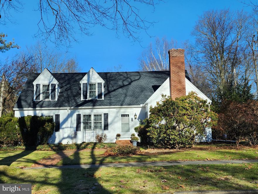 Lovely dwelling, beautifully located on a stunning corner lot in treasured West College Heights neighborhood. Step inside, notice hardwood floors, French doors, built-ins, and unending charm that fills this adored home. Discover a sweet and spacious kitchen with cozy eat-in area ideal for morning coffee. The dining room is perfect for relaxing over meals and making memorable celebrations with family and friends. An electric fireplace graces the generous living room, providing ambiance and comfort while winding down or entertaining guests. Discover a delightful office, filled with natural light and views to the outdoors, making it an ideal location for concentration. Completing the main floor is a nicely sized family room and a convenient half bath. Ascend to the upper level and find three bedrooms, one is serving as an office, and a full bath. One-car garage, new roof; PSU campus, downtown, shopping, restaurants, golf course and bike path just blocks away.