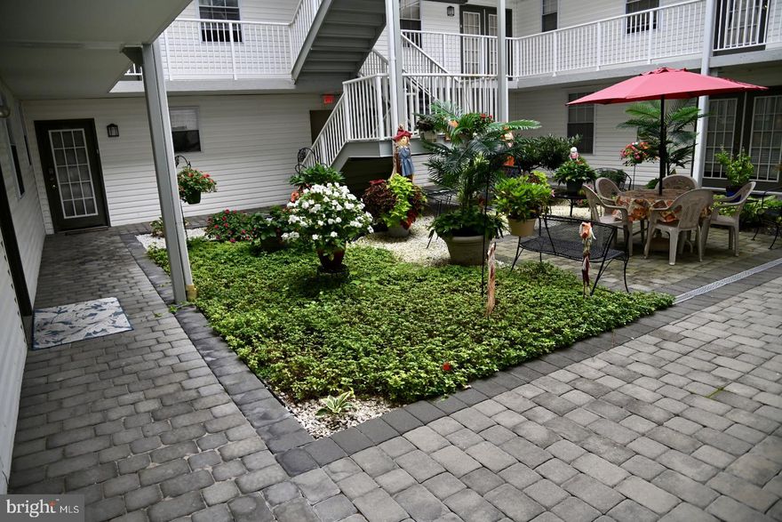 Yearly taxes just $3,220!! Rare opportunity at the area's best 55 Plus Active adult condo development!! Large corner 2BR 2BATH unit with formal dining room, Newer laminate and carpets. This carefree condo feels like a single home with windows on 3 sides and a patio that leads to your own back yard. Out your front door is a charming courtyard providing both garden views and a great place to socialize with your neighbors. Condo fee provides 1st cable tv, set up,  water, sewer, trash removal, snow removal, security system monitoring, indoor year round 25M saltwater swimming pool, exercise room, ball room, game room,  and card rooms.  The unit itself is a very nice 2 br layout with separate dining room looking out to the beautiful open air courtyard.  Concrete construction and sprinklers throughout. Kitchen pictures have been electronically decluttered. No dogs except service/support animals.