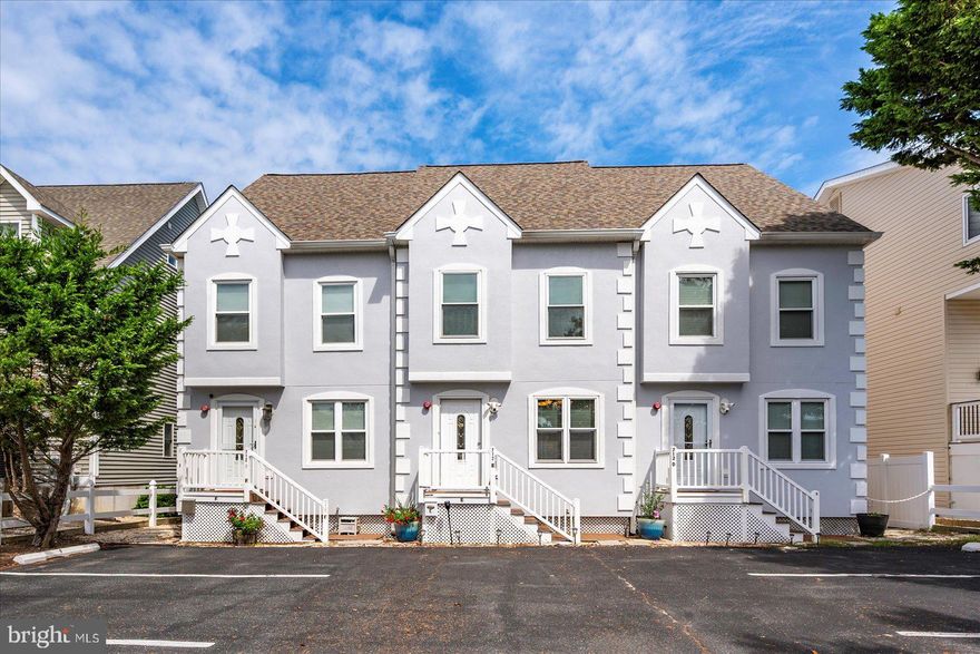 Nestled in Bradley Cove on the bayside of 94th Street, this three-bedroom, 3.5-bath townhouse blends coastal charm with modern conveniences. Enjoy private dock access, a double floating jet-ski dock, and stunning canal and marina views truly a boater’s paradise. This three-story home offers open living spaces, including an eat-in kitchen with new countertops, a deck off the living area, and two waterfront bedrooms—each with its own en-suite bathroom. The loft bedroom suite adds flexibility for guests or additional living space. Recent updates include new windows, fresh paint, new slider doors, and other thoughtful upgrades throughout. Two assigned parking spots and low condo fees make this property perfect for full-time waterfront living or the ideal vacation retreat.