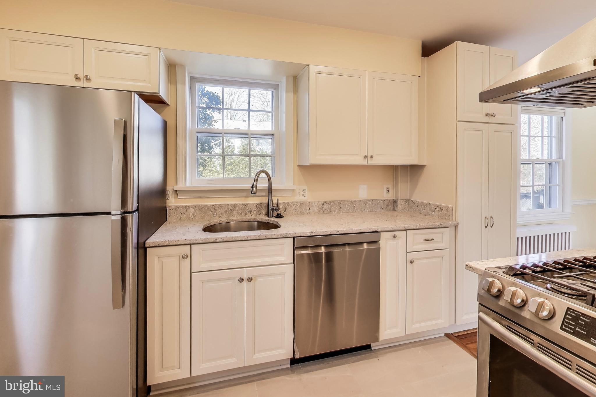 CLASSIC BETHESDA --3 bedroom + 3.5 bath! A charming 3-bedroom, 3.5-bathroom house located in the sought-after Bethesda, MD area. This home features an updated kitchen area beautiful Granite and Stainless OPEN Concept, perfect for cooking and entertaining. With off-street parking, hardwood flooring, and a renovated En-Suite Bath, this house offers both comfort and style. Enjoy main level living this room can either be a bedroom or an office space for added convenience and living room with decorative fireplace. Step outside to a large backyard, ideal for outdoor activities. Plus, with its close proximity to the Metro, commuting is a breeze. Don't miss out on this fantastic opportunity to make this house your new home! LONG TERM LEASES OK. CLOSE TO DC, NIH, WALTER REED, METRO!