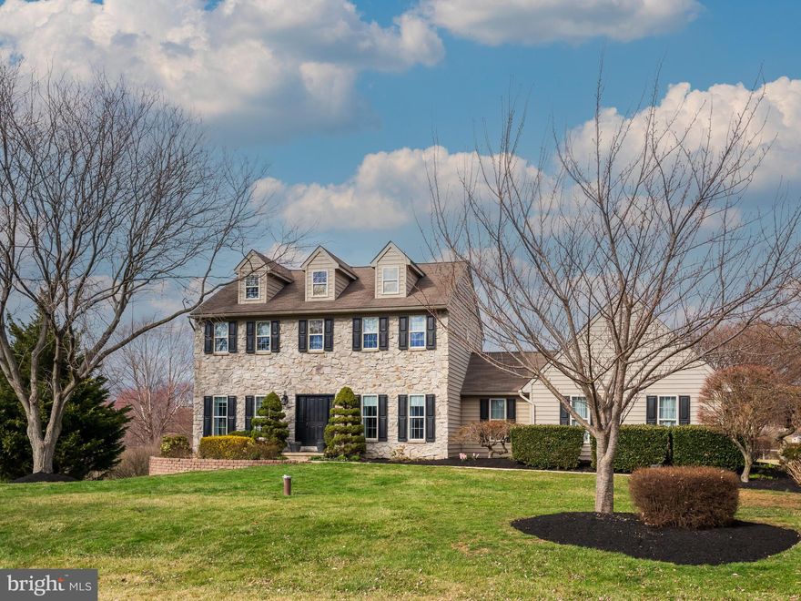 This breathtaking stone-front farmhouse-style home in Charlton Farms is a true gem! It boasts an array of high-quality updates and upgrades throughout. Upon entering the impressive two-story foyer, you'll immediately notice the gleaming hardwood floors that flow throughout the main level. The open-concept design creates a warm and inviting atmosphere, highlighted by a floor-to-ceiling stone fireplace in the family room, which can be admired from both the living room and the stunning kitchen. Completely renovated in 2021, the kitchen features upgraded cabinetry, stainless steel appliances, quartz countertops, custom lighting, and a spacious walk-in pantry.

The breakfast room leads to an expansive rear deck, complete with a built-in gazebo and ceiling fan, perfect for outdoor enjoyment. Both the deck and the living spaces overlook the beautifully landscaped backyard and offer a picturesque view of the neighboring 24-acre horse farm. The exterior also includes a charming stone walkway from the driveway to the rear deck.

Upstairs, you'll find four generously sized bedrooms, including a primary suite with a beautifully renovated shower and bath. The lower level offers a walk-out entrance to the backyard, an exercise room, a recreational space, and plenty of room for storage.

Recent updates include a new HVAC system and water heater in 2020, a complete kitchen renovation in 2021-2022, and a new front door with sidelights in 2021. For more details on additional special features, please refer to the attached sheet.

Homes in communities like Charlton Farms, with properties over an acre in the Avon Grove School District, are becoming increasingly rare. This home is conveniently located near Route 1, as well as Newark and Hockessin in Delaware.