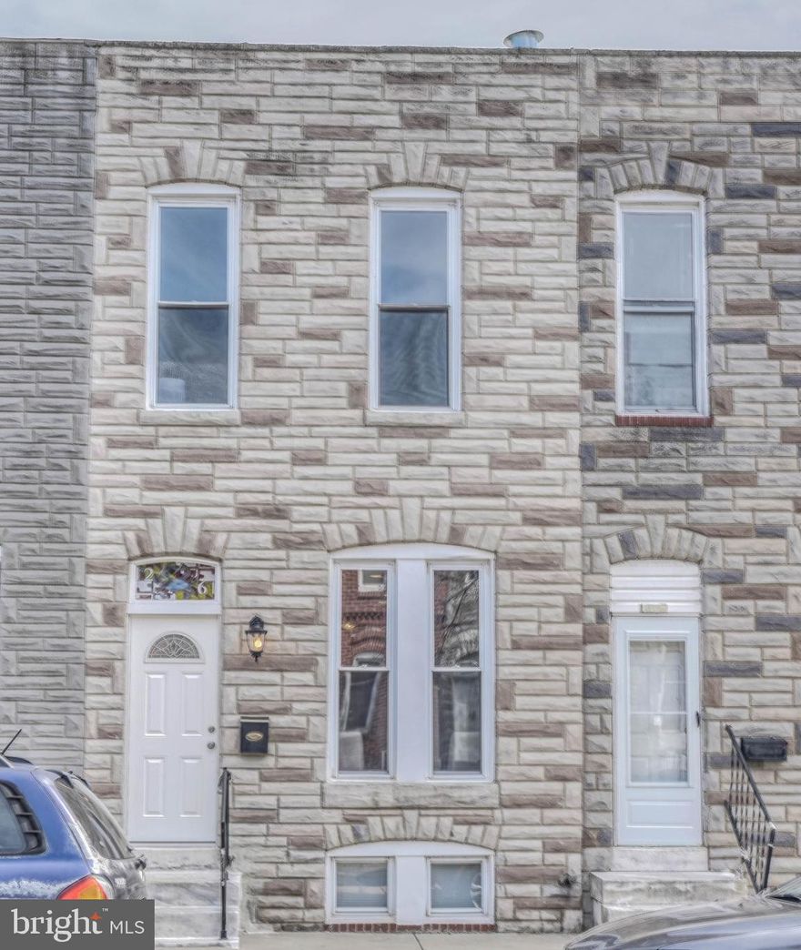 Beautiful renovation in the heart of revitalized Washington Village. Best block in the community! Everything you could need and want in terms of updates. First floor has been reorganized to give an open feel throughout the main level. High end kitchen and new flooring. Powder room added to the main floor. Step upstairs to a totally reconfigured upper level with three full bedrooms, featuring a primary bedroom with new en suite bath to enjoy. Plenty of space for guests, roommates, or office in the other bedrooms. Huge basement ready for your design ideas! New flooring, HVAC, fixtures, appliances, and more. Just minutes to Oriole Park, M&T Bank Stadium, UMMC, VA, Horseshoe, and more. Why rent when you can live the good life here?