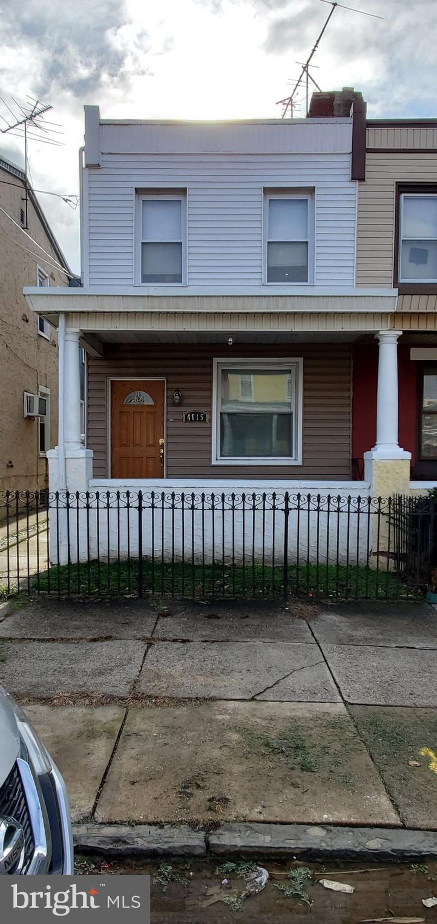 Come take a look at this Beautifully Maintained and Updated Bridesburg Twin.  The exterior features newer front siding and a covered front porch. On the main level you'll find a spacious open floor plan featuring livingroom / dining areas and hardwoods throughout.  Newer remodeled kitchen offers recessed lighting,  s/s appliances, cabinets , granite countertops,  c/t backsplash.  Updated full bath with shower and c/t floors.  Nice large pantry/ bonus room next to kitchen as well. Exit out to fenced in rear yard space with shed. Upstairs boasts a large master bedroom with beautiful modern bath with jet tub, C/T floors and tub surround and.. walkout to a nice outdoor deck space !. Two additional nice sized bedrooms with plenty of closet space.  Large semi finished basement, Newer hot water heater and much more...Close to I-95 , shopping , schools and transportation.  This great home is a must see !. Make your appointment today.