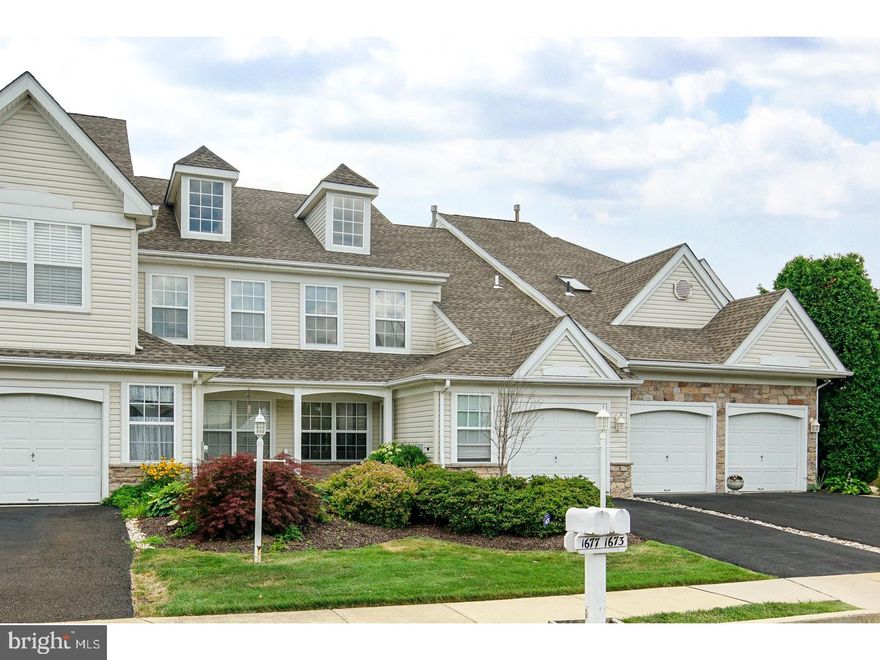 Fantastic townhome ideally located in the desirable Windrush development in Warwick Township! This gorgeous home has been well-maintained and upgraded throughout! Features include:  Newer hardwood flooring throughout adjoining living and dining rooms! Dramatic two-story family room with newer hardwood flooring, recessed lighting and access to the spacious rear deck! The kitchen has been recently updated with granite counters, tile backsplash and flooring and stainless steel appliances! A powder room completes the main floor! The second floor features a spacious master bedroom suite with an elegant tray ceiling and a large walk-in closet! The private master bath features a sumptious soaking tub and stall shower! A spacious second bedroom, full hall bath and laundry finish off the second floor! Newer neutral painting throughout! One-car attached garage with great storage space! Conveniently located to major roads, transportation, great shopping, and  restaurants! Affordable HOA fee covers snow and trash removal and lawn maintenace! Make your appointment today to see this gorgeous home! This one won't last!