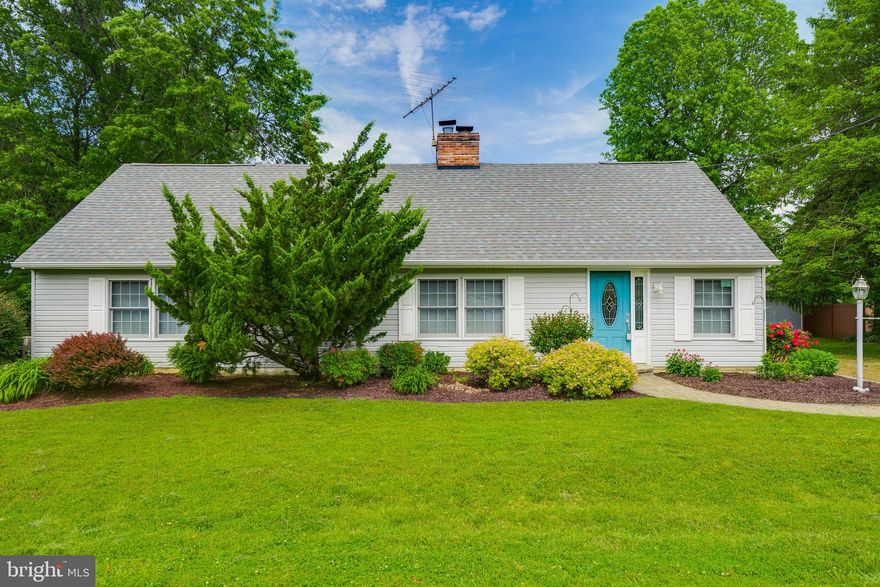 Beautifully updated Cape Cod  in the water oriented community of Hollywood Beach.  Waterview and only one block to the community beach, pier, clubhouse and park.  Updates galore! Open floor plan! Huge waterview master with luxury ensuite and side patio.  Gourmet Kitchen with granite counter top, stainless steel appliances, glass top stove, convention oven and dishwasher.  Upstairs loft features two bedrooms and an open balcony family room. Entertain on the massive 800 sqft composite deck with hot tub or snuggle by the fireplace that opens to the kitchen and the living room. New roof (2013) Community pier boast 37 slips w/lifts (for additional fee).  Hollywood Beach has so much to offer - community clubhouse, beach, swim raft, two parks, playground, picnic tables, fire pit and so much more.