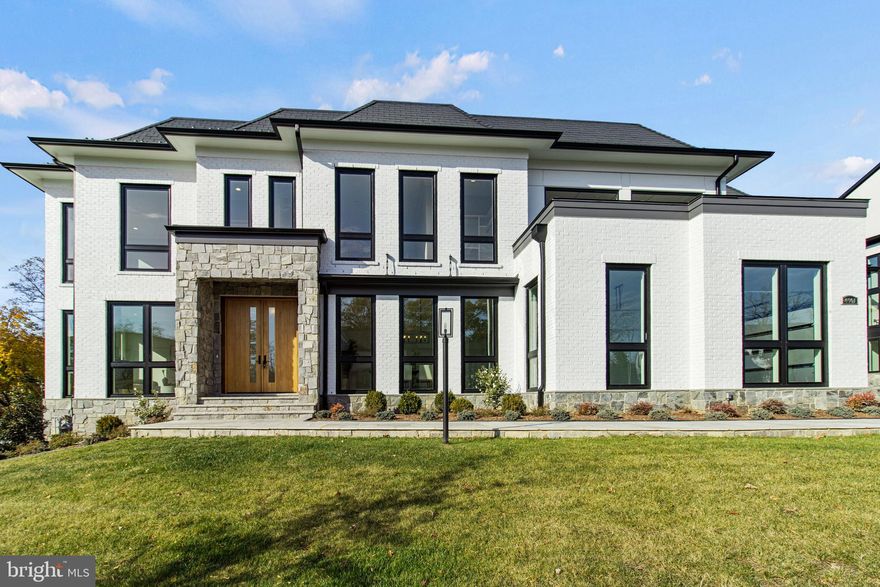 Move in Ready! Certificate of Occupancy in hand!
Nestled in an exclusive enclave of eight luxury residences, this stunning new home merges convenience with unparalleled sophistication. Located a stone's throw from downtown McLean, Tysons Galleria, and the Metro, this property boasts approximately 10,305  sq ft of opulent living space across three levels including the outdoor living areas.
This spectacular brand-new home is ready for the most discerning Buyer, one who appreciates superb quality and incredible design. Nestled in the prestigious heart of Mclean is our Halls Manor Community. The only new construction community in Mclean.
Premier Homes proudly presents the impressive Onewood model that stands as a distinct and singular offering within the neighborhood, boasting a unique combination of transitional and modern architectural styles that set it apart from conventional Virginia homes.
Upon arrival, a stone-clad pathway marks the entry to this remarkable 7,828 square feet of living space spread across three finished levels. The home comprises 5 bedrooms, 7 baths, a gym, spa, 2 outdoor kitchens, a functional elevator, and a spacious 3-car garage. The Onewood model embodies elegance and functionality, featuring a striking formal living room, a spacious dining room, and a well-appointed open floor plan family room adorned with signature floor-to-ceiling windows, bathing the interiors in natural light. Leading from the family room, a delightful retractable screened porch awaits, complete with a double-sided fireplace, seamlessly connecting to an expansive deck and featuring a full outdoor kitchen with a grill, sink, refrigerated drawers, and Deckton countertops, setting the stage for seamless outdoor entertaining.
The stunning kitchen serves as a central hub for relaxation and gatherings, boasting a large quartz waterfall island ideal for presenting culinary delights or accommodating casual meals. Complete with two dishwashers, a pot filler over the 6-burner gas stove, stainless steel appliances, and a prep-area pantry with a separate sink, this kitchen offers the perfect setting for family and friends to gather for holidays or special occasions, with its seamless connection to the family room and outdoor deck. Adjacent to the kitchen, a mudroom and storage closets lead to the 2-car and 1-car garages, ensuring practicality and organization.

Ascending to the upper level, meticulous attention to detail adorns 4 bedrooms, with a grand hallway featuring decorative ceiling details, offering a sense of refined elegance throughout the residence. Each bedroom is designed to provide comfort and luxury, catering to family living or hosting guests with style and grace. The Owner's suite which is a true retreat featuring a private terrace overlooking the community with retractable screens. The suite also features a wet bar, sitting room with a double-sided fireplace and room for a study. The spa bath has a beautiful stand-up steam shower with the bathtub inside to connect the two into one spa like space that immediately captures your attention. Two toilet rooms and two large walk-in closets, one with an island.
The lower level is surrounded by windows creating a non-like basement feel. It accesses the rear stone terrace with yet another full outdoor kitchen and outdoor fire table which gives you the opportunity for ample space for entertaining. Fully fenced back yard. Lower Level also features full wet bar including a dish washer, microwave and beverage fridge. Behind the bar is the tasting room with plenty of space for all your wines and fine beverages.
In summary, this unparalleled property exemplifies the pinnacle of modern living, with a unique blend of luxury, functionality, and exceptional design. Total sq. footage includes outdoor living and garages.