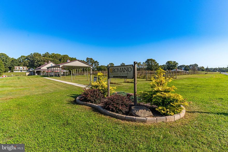 Nestled amidst the idyllic landscape of Brandywine, strategically positioned for easy access to Washington, DC, Virginia, and Southern Maryland, a truly unique opportunity awaits.

This is a rare and enticing chance to acquire the very first commercial winery in Prince George’s County, MD. Founded in 2007, Romano Winery has a storied history of profitability until its temporary closure to the public in June 2023. Now, the baton is passed to you, offering the opportunity to build upon the foundations of success and elevate this business to new heights.

The offering comprises three parcels spanning nearly 23 acres of picturesque, rolling terrain, complete with vineyards, woodlands, and open fields. Adding to the appeal is a 3,453 SF two-story custom home, offering 3 bedrooms and 3.5 baths with picturesque views. Inside, find exquisite wood plank flooring, a spa-like whirlpool tub, dual-zone heating, a finished basement, a sprawling deck, and a bonus room above the finished two-car garage. The kitchen is adorned with Corian countertops, custom cabinetry, new stainless appliances, and freshly installed LTV flooring. A 16’x20′ two-story shed and 50’x30’ workshop/pole barn enhance the property’s utility.

Descending from the residence, you’ll encounter a separate tasting room containing 2,300 SF plus prep kitchen and additional storage space. Attached to this space is a 40’x60’ Pavilion, providing patrons with a serene environment to savor the winery experience while gazing upon the vineyard’s beauty.

On the direct opposite side of Bald Eagle School Road lie two additional parcels with their own vineyards. Here, you’ll discover a purpose-built 40’x60’ production facility and an additional 65’x30’ pole barn/workshop, all designed to support the grape-growing and wine-making process.

The vineyard itself, initially planted in 2007 with additional plantings in 2017, boasts approximately 1,600 vines, including varietals such as Vidal, Chambourcin, Cayuga, Traminette, Viognier, and Petit Verdot. Over the years, the vineyard has yielded an average of 8 tons of grapes annually, with the benefit and flexibility of procuring additional grapes from partner vineyards.

In terms of production, this boutique winery has historically produced between 1,500-2,000 cases annually, with the potential to expand to 8,000+ cases within the existing facilities with additional equipment. The growth prospects are exciting, with opportunities to host weddings and events, explore wholesale distribution, and resurrect the once-popular wine club.

Romano Winery has a strong track record of profitability, and its prime location, nestled between two other wineries, and accessible to major metropolitan areas, positions it perfectly to re-establish itself as a prominent and sought-after winery destination under new ownership.

Embark on your dream of entering the thriving wine industry in Maryland. Romano Winery’s legacy of success and its strategic location await your vision and creativity. Don’t miss this chance to make your mark in the world of fine wines.

Additional photographs, business information, and private tours available upon the execution of a Non-Disclosure Agreement, and provision of verifiable Proof/Source of Funds letter directly from a recognized financial institution.