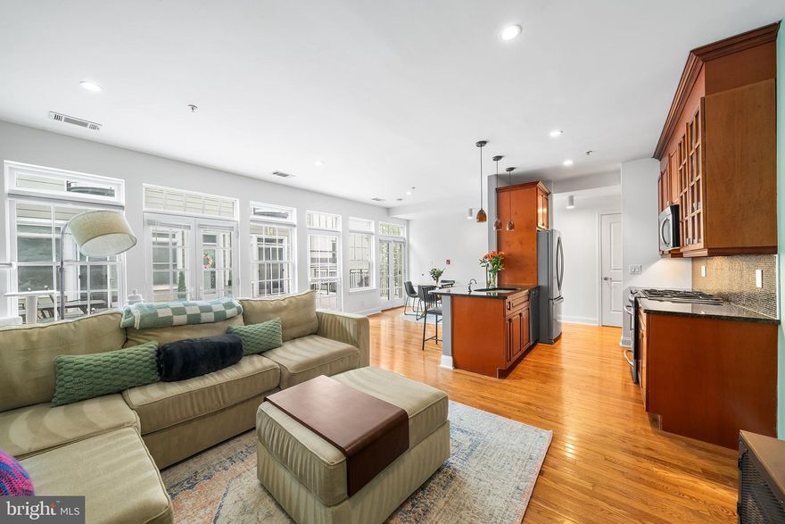 ***Preferred lender is offering a 1 year rate buydown, inquire with listing agent***Live in the Heart of Fishtown – with Rare Garage Parking! Welcome to Shackamaxon Court, a unique gated community tucked just behind Two Robbers and Shackamaxon Pizza. The impressive iron gate, designed by a local Fishtown artist, is a recognizable neighborhood landmark. While you’ll have some of Philly’s hottest restaurants and bars right outside your door, this unit is set back from the street, offering peace and quiet in the middle of it all. Enter from Shackamaxon St, Day St, or directly through your private parking garage into the professionally maintained courtyard — a true rarity in Fishtown. The unit entry is directly from the patio, creating a seamless indoor-outdoor flow and allowing you to enjoy the courtyard as an extension of your living space. Inside, you’re welcomed into a spacious open-concept living and kitchen area, ideal for entertaining. The living room easily fits an oversized couch and dining table, and natural light pours in through French doors that open to the patio. Design lovers will appreciate the flexible layout, perfect for creative furniture flow. The kitchen features granite countertops, stainless steel appliances, custom built-ins, and a breakfast bar for casual meals or morning coffee. Off the kitchen, a large pantry provides extra storage and can be styled as a coffee station or mini bar. Down the hall, a stacked washer/dryer with bonus storage makes laundry convenient. A large secondary bedroom with dual closets and oversized windows is perfect as a guest room, home office, or both. A full bath with tub and linen closet leads to the primary suite — a spacious retreat with abundant natural light, generous closet space, and an ensuite bath with walk-in shower. Additional highlights include beautiful hardwood floors, extra storage in the garage area, professionally maintained courtyard and spacious, light-filled rooms. The location is unbeatable: just steps to La Colombe, Frankford Hall, Middle Child Clubhouse, R&D Cocktail Bar, and more. Stay active with City Fitness, In Flow Studio, and Monarch Yoga all within walking distance. For commuters, I-95 is moments away and the Girard El stop is less than a 5-minute walk. Experience the best of city living — vibrant, convenient, and secure — all within a tree-filled, gated community with private parking. Schedule your showing today!