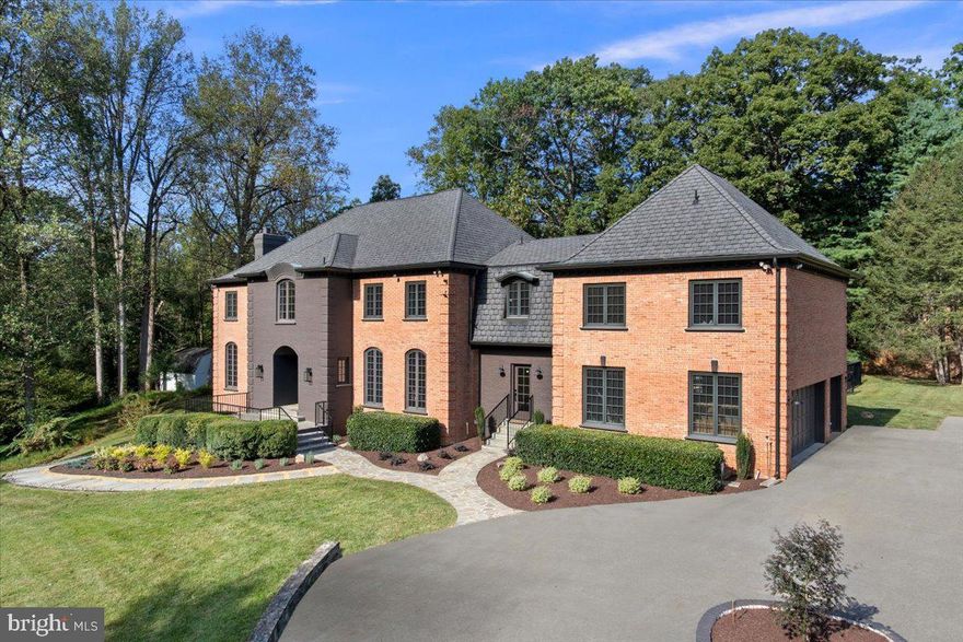 Experience luxury reimagined in this 10,100 sq. ft. fully renovated masterpiece, gracefully set on 2.37 acres of manicured grounds in the heart of Potomac. Thoughtfully designed for both grand entertaining and everyday comfort, this home blends timeless architecture with modern elegance.

Enter through the stately 66” double front doors and into a light-filled foyer that opens to expansive formal and casual living spaces. The main level features a formal living room, private office, and a beautiful dining room designed for memorable gatherings. The open-concept family room, breakfast area, and chef’s kitchen are the heart of the home, complete with top-of-the-line appliances, an expansive island, and a walk-in pantry. A spacious mudroom with custom cubbies and built-in storage offers both function and style, keeping the home organized and refined.

Seamless indoor-outdoor flow invites you to the resort-style pool and spa, accessible directly from the main floor—a perfect extension of your living space for effortless entertaining.

Upstairs, the primary suite is a serene private retreat featuring two sitting areas, a built-in mini bar, one oversized walk-in closet, and additional side closets. The spa-inspired dual en-suite bathrooms offer comfort and privacy, creating a true sanctuary. The second floor hosts five bedrooms, each with en-suite or adjoining baths, a laundry room, and a spacious loft ideal for relaxation or study.

The walk-out lower level is an entertainer’s haven—complete with a custom bar, kitchenette, gym, and a bedroom with en-suite bath.

Outside, the home’s multiple sitting areas, stone pathways, and lush landscaping create a resort-like ambiance. A charming, well-sized shed and a three-car garage complete this extraordinary property.