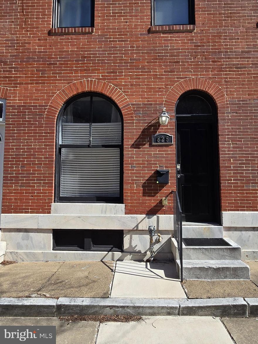 Back on Market: Charming All-Brick Home Just Minutes from Johns Hopkins!
Price Improvement by $10k!  Welcome to your new home! This beautifully maintained brick residence offers comfort, style, and convenience in one of Baltimore’s most accessible neighborhoods. Step inside to find a bright and inviting living room featuring a large picture window that fills the space with natural light. The home includes two generously sized bedrooms, each with oversized walk-in closets and upgraded carpet for added comfort. You’ll also enjoy the convenience of two full bathrooms, one on each level—perfect for guests or shared living.
The spacious eat-in kitchen boasts modern stainless steel appliances, premium plank flooring, and ample room for cooking and dining. Central air conditioning and heating, along with an in-unit washer and dryer on the upper level, ensure year-round comfort and convenience. Both bathrooms feature stylish tiled floors, and mounted TV brackets are already installed for your entertainment needs.  
Outdoors, enjoy your private fenced-in concrete patio, ideal for relaxing, entertaining, or creating your own outdoor oasis. Additional features include an alarm system, a storage area in the basement, and plenty of natural light throughout.
Located within one mile of Johns Hopkins Hospital, Oncology Center, and the Johns Hopkins Metro Station, this home is a perfect option for professionals, students, and commuters alike.