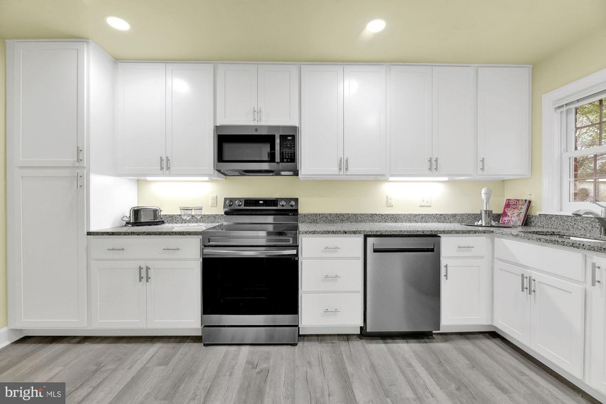 Welcome to 412 Brightwood Club, your gorgeous penthouse in the trees! This light filled condo offers a completely brand new kitchen, private elevator,  separate dining room, working fireplace, 9' ceilings, huge master suite, second bedroom and bath and a private balcony!  Nothing to do but move in and enjoy your best life. The upper floor units are a must for those that love natural light, and this unit basks in sunlight!  To access your beautiful new home, you have your very own private elevator!  The spacious balcony provides lovely views all year long.  Brightwood is the premier community for those 60+.  Enjoy concierge living, unimaginable services and security and gracious community.  This lovely home is priced to sell, but hurry it won't last long!