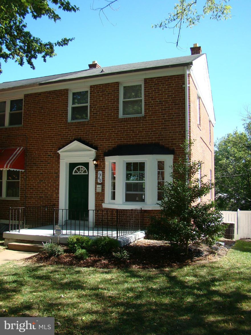 BEAUTIFUL REMODELED EOG TH!  HOME WARRANTY**NEW WINDOWS**NEW KITCHEN WITH GRANITE COUNTERTOP, GRANITE BREAKFAST BAR, AND NEW SS KITCHEN APPLIANCES**SHINING HARDWOOD FLOORS THROUGHOUT FIRST AND SECOND LEVEL**FINISHED BASEMENT WITH NEW CARPETING**LARGE YARD WITH REAR PARKING PAD**COVERED REAR PORCH**DON'T MISS YOUR CHANCE TO SEE THIS BEAUTIFUL HOME**CALL TODAY TO SCHEDULE A SHOWING