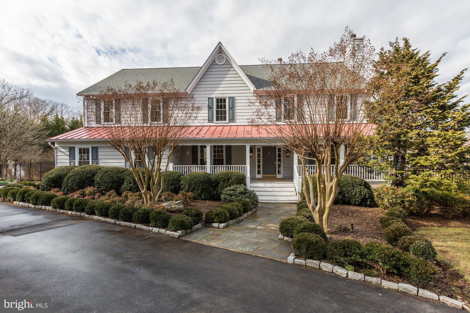 Quintessential Potomac farm house w/welcoming front porch, exceptional interior w/high ceilings & great natural light. BIG dining room w/FP, sunrm, library & dramatic vaulted ceiling FR open to renov country kitchen. 3 fully fin lvl incl au pair/in-law suite, daylight, walk-out lwr lvl. Over 2 acs magnificent grounds w/gardens galore. Handsome hardscaping" stone terrace, koi pond, fireplace. WOW!