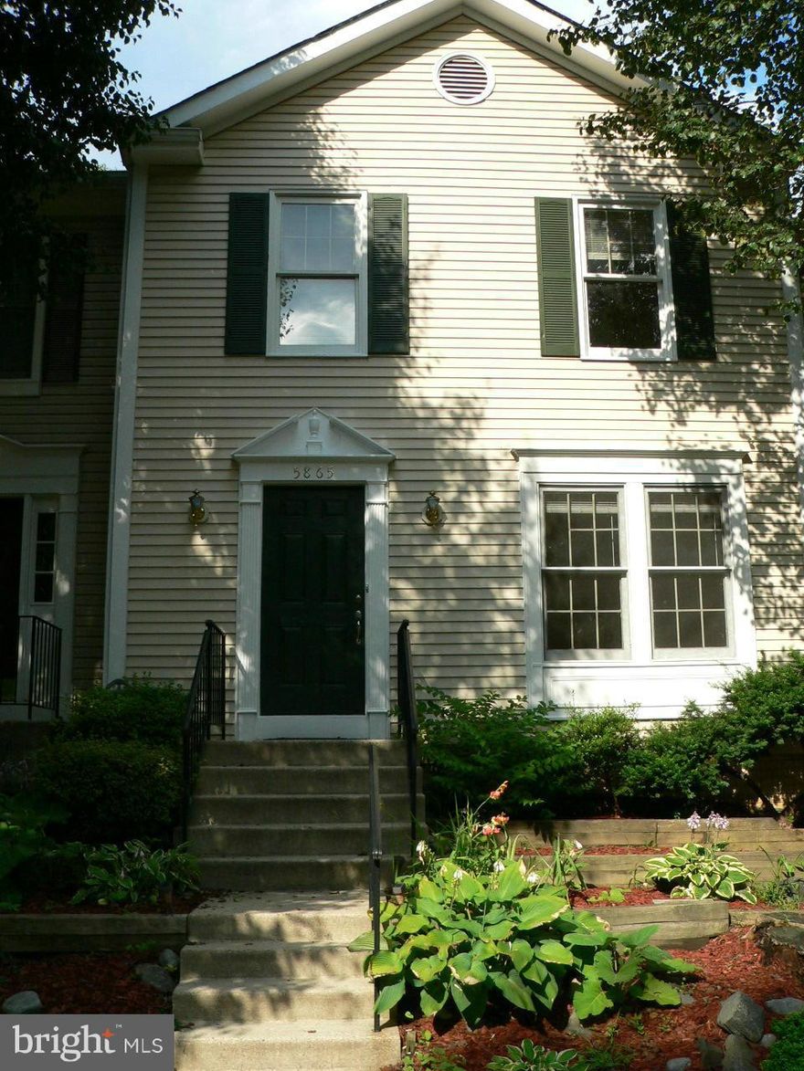 Don't miss this beautiful double master townhouse w/ bonus room and full bath in basement , walk in closets, bright kitchen w/ sun room and skylights, ceiling fan, gas stove, deck/balcony, fenced back yard backing to mature trees, bright rec room w/ wood fireplace in walkout basement, newer paint and refrigerator. Close to shopping, bus, 66, 28, 29. Landscaping, no lawn to mow! Great location!!