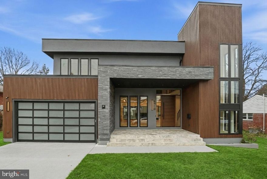 The Quintessence of Modern Luxury 
This architectural masterpiece redefines contemporary living with soaring 10-foot and 9-foot ceilings and majestic 8-foot solid-core interior doors that create a grand, airy atmosphere throughout. Flooded with natural light via strategically placed skylights, the home is a showcase of "understated opulence," featuring bespoke accent walls in every room and dazzling luxurious chandeliers that serve as functional art. 
Culinary Excellence: The main kitchen is a chef’s sanctuary, featuring Dekton countertops and backsplashes for ultimate durability and style. For high-tier entertaining, the prep kitchen includes a full-sized 36" refrigerator, while the sun-drenched breakfast area is anchored by a custom texture-rich accent wall.
Entertainment & Wellness: Host with ease at two sleek wet bars equipped with under-counter wine refrigeration. The lower-level media room offers an immersive experience with its fiber optic "star-field" stretch ceiling, while the dedicated home gym features pro-grade rubber flooring, mirrored walls, and a wall bar for a complete boutique fitness experience.
The Primary Retreat: Unwind in a spa-inspired sanctuary featuring curbless steam showers, a sculptural freestanding copper soaking tub, and dual copper vessel sinks. Even the functional spaces are elevated, with walk-in closets featuring built-in LED strips and a skylit laundry room with designer finishes.
Seamless Indoor-Outdoor Living: Transition effortlessly to the Silver Veincut travertine patio, fully equipped for year-round comfort with integrated ceiling heaters and motorized screens.
Polished Utility: The property is as practical as it is beautiful, featuring a dedicated private office with hidden-track barn doors, a high-end powder room with integrated Dekton sinks, and pristine epoxy-coated flooring in both the driveway and the garage.
Please check 3D Tour and Photos.