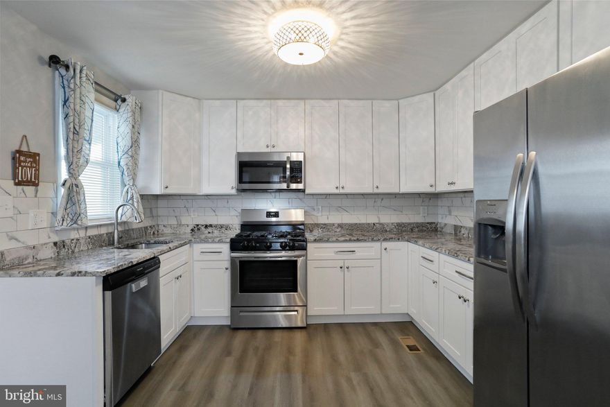 Welcome Home to 5941 Central Ave! This charming rancher has been fully updated and is ready for you to move right in! As you enter the home, you'll notice the brand-new LVP floors throughout the main level. Walk into your large kitchen and find modern white cabinets and granite countertops that sweep around the entire kitchen, providing ample prep space. The main family room is the perfect atmosphere for entertaining guests or simply relaxing after a long day. Continue to the back of the home and find the three main-level bedrooms that share a fully updated bathroom.

That's not all! Head downstairs to the fully finished basement and find the huge entertainment room and two flex rooms with closets, perfect for those needing a work-from-home setup. There is also a beautifully updated full bathroom just off of the entertainment area. There is also plenty of storage space in the utility room which can also be used as a home gym. The backyard is the perfect setup for outdoor living, barbecues, or just enjoying the weather.

This home is ideally located with quick access to I-70, I-695, and Rt40, and is under 15 minutes from the Inner Harbor and popular Baltimore neighborhoods. Book your tour today! **OFFER DEADLINE: Sunday 2/10 @ 8:00pm**