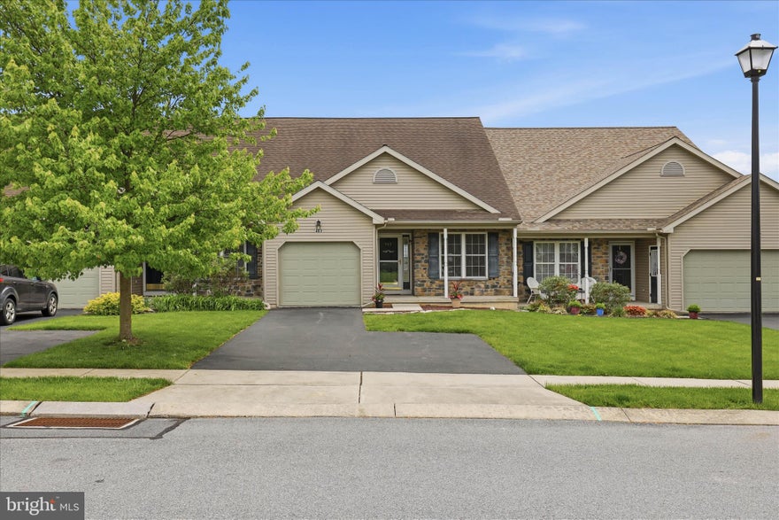 Nestled in the Mallard Pond III community, this original owner home offers convenient one-floor living. Spanning 1416 sq. ft. on the main level, the home features an open-concept layout highlighted by a vaulted living room with cozy gas fireplace and a tranquil sunroom with walls of windows. The spacious primary suite offers its own full bath and walk-in closet, while a second bedroom and additional full bath provides ample space for guests. Retreat to the partially finished, carpeted daylight walkout basement, offering endless possibilities for care-free and comfortable living. Ample parking in the driveway with guest parking available directly across the street. Easy access to Manheim & Lititz- minutes from Rt. 772 & 72. Enjoy peaceful living in a lovely neighborhood setting with effortless proximity to local amenities.