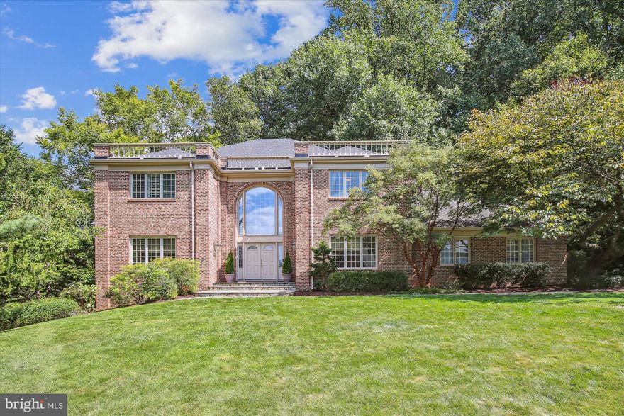 Welcome to 10321 Hickory Forest Drive - an exceptional Oakton residence in Hickory Hollow Forest an enclave of 21 custom homes. Prepare to be impressed with this 5 bedroom (optional 6th), 4 full bath custom estate that is sited on a park-like .57 acre lot. With impressive curb appeal, it features a slate walkway to the front porch and double doors to the two story foyer which leads to an inviting floor plan with spectacular formal and informal spaces.  This meticulously maintained home offers only the finest quality and finishes throughout. Boasting more than 6,000 sf of functional living space and over $600,000 in updates this home was made for gathering and entertaining with a spectacular custom kitchen that opens to a large deck with handicap accessible ramp, a lodge style great room with fireplace, built-in seating and wonderful views of nature, and a lower level that houses a state of the art theatre complete with automated cinema curtain.  The home offers an ideal environment for multi-generational living with an incredible primary suite on the upper level, a main level bedroom adjacent to a full bath and a lower level in-law suite with double doors to a private garden, plus 2 additional spacious upper level bedrooms that share a hall bath.  The attention to detail is unsurpassed with custom doors and Anderson art glass windows, hand crafted built-ins, hardwoods on 2 levels, a renovated kitchen and 4 renovated baths.  The parklike setting is a dream with a private garden, koi pond, and walking paths through the trees, enjoy entertaining on the deck, or a quiet evening on the patio watching nature unfold.  Public water and sewer are a bonus and allow for the potential to add a pool.  Desirable Oakton Elementary, Thoreau Middle, Oakton High School pyramid. Minutes from the Oakton Shopping Center with Starbucks, CVS and Giant, and quick access to major commuter routes - 66, 495 and the Toll Road, 3 miles to the Vienna Orange Line Metro.