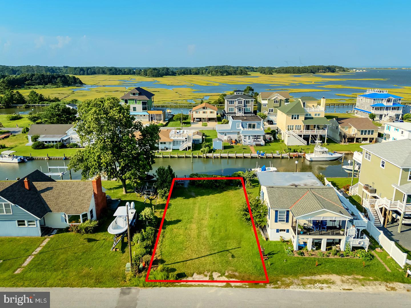 Don’t miss this exceptional opportunity to own a .11-acre waterfront lot with direct boating access and panoramic views. This property features a private 37-foot boat dock along the rear, nestled on the scenic Tompkins Canal, offering easy navigation for watercraft enthusiasts.
From the front of the lot, enjoy unobstructed views of Assateague Island and the iconic Verrazano Bridge—a breathtaking backdrop for your future home or getaway retreat. A private septic permit has already been applied for, saving you time and effort in the building process.
With no HOA restrictions, you have the freedom to build and use the property your way. Whether you're looking to create a peaceful escape, a fisherman’s haven, or an investment opportunity, this waterfront gem is ready to bring your vision to life.