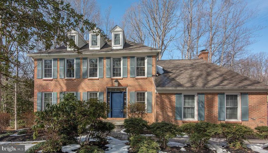 Nestled in the heart of Manassas, this charming 3-bedroom, 3-bath Colonial offers the perfect blend of comfort, character, and privacy. Situated on a beautiful wooded lot, this home provides a peaceful retreat with scenic views from nearly every window.

Inside, you’ll find a warm and inviting family room featuring a cozy fireplace and custom built-ins, creating the perfect gathering space. The spacious primary suite also boasts its own fireplace, offering a private and relaxing escape. Thoughtfully designed built-ins throughout the home add both charm and functionality.

The finished basement includes a convenient kitchenette, making it ideal for entertaining, extended stays, or flexible living arrangements. Step outside to double decks overlooking the private, wooded backyard — perfect for morning coffee, evening relaxation, or hosting guests surrounded by nature.

This classic Colonial delivers timeless style, versatile living space, and a serene setting — all in a sought-after Manassas location.