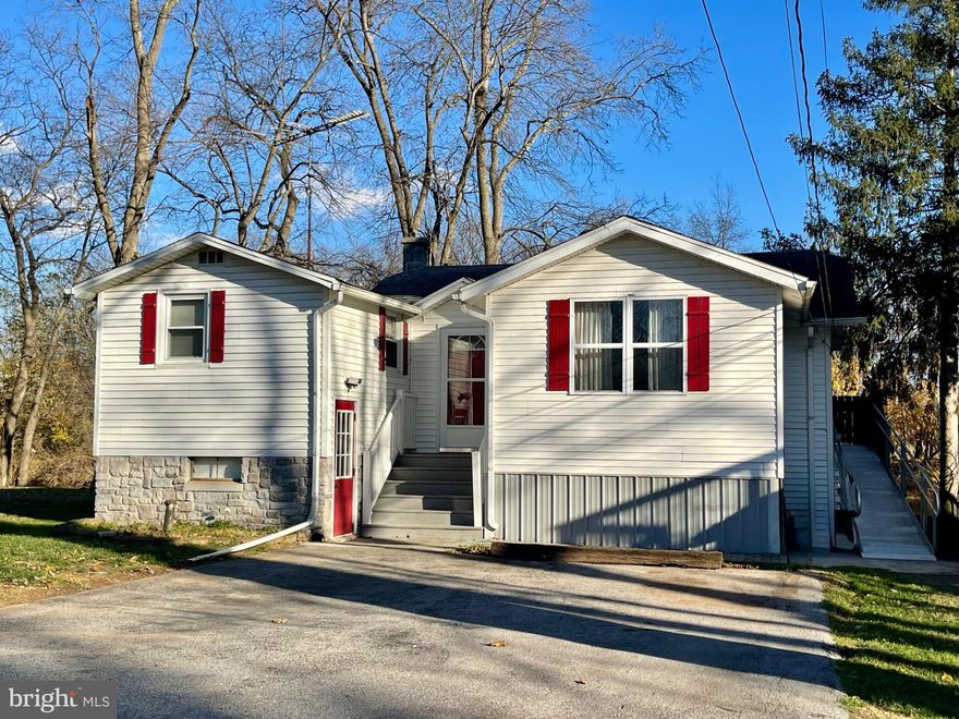 Sieze the opportunity to own this waterfront property along the Conewago Creek.  This 2 bedroom, 1 bath home has an open floor plan and has splendid vaulted, wooden ceiling.  The one bedroom is large and could easily be made into 2 rooms.  Kitchen comes with a dishwasher, refrigerator, gas stove, and plenty of cabinets. Laundry room equipped with a washer and gas dryer. Relax in front of the fireplace through the winter and enjoy the warmer months grilling and taking in the views from the large deck.  Your private dock allows you to swim, fish, kayak, canoe, and observe wildlife like ducks, geese, blue heron, deer, and turtles just steps from your back door.  The basement is ready for your vision to make it your own personal space.  Two sheds on the lot allow for additional storage.  Home comes with a ramp along the side to allow access onto the back deck and entrance to the home.  Come and see all the charm this home has to offer.