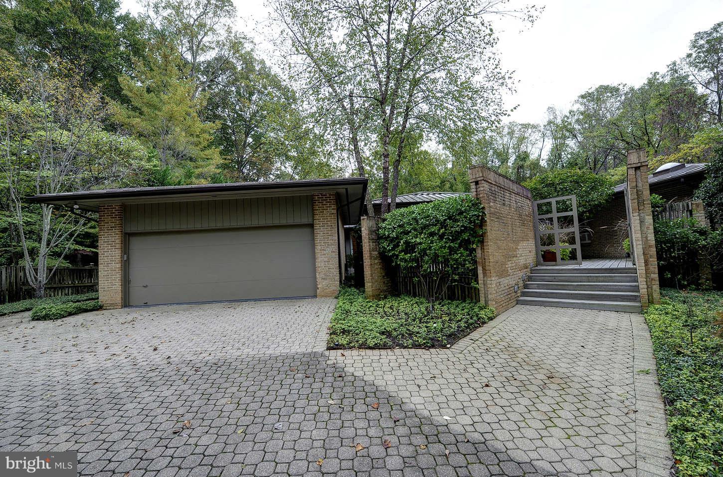 Vacation at home- Private wooded setting - wonderful rambler with large sunlit interiors- e gracious front foyer - inviting living rm w/cathedral ceilings and fp- formal dr- large gourmet kitchen- enchanting four season sunroom with views of pool,deck and lush landscaping-Large master suite with renov spa like bath- two additional bedrooms each with private bath BACK ON THE MARKET!!!