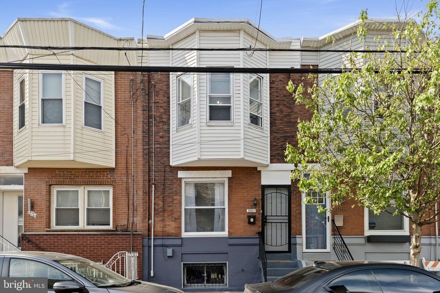 It is my distinguished honor to present to you 2054 McKean St., a interior rowhome property in Point Breeze, South Philadelphia. INTRODUCTION: Located in the Heart of South Philadelphia, adjacent to a transformative intersection, anchored by a Commercial Mixed Use Corridor on Washington Ave, Point Breeze Ave., and the 25th St. Viaduct, surrounded by residential properties and commercial spaces, South Philadelphia has undergone major transformation. This property offers great potential as a primary residence or investment opportunity.                                                 
HIGHLIGHTS:
 Bright open-concept living area with large windows and abundant natural light
throughout
 Vestibule entrance and new luxury vinyl plank flooring on the main level
 Spacious dining area with access to the basement
 Modern kitchen with quartz countertops, new fixtures, touchless faucet & gas stove
 Private rear patio, freshly painted and cleaned, with new exterior lighting
 Clean, high-ceiling basement (parged and painted) with washer/dryer hookup .
 Updated systems: newer water heater & furnace, updated PVC sewer line
 Beautiful staircase with oak railings, balusters, and oak step veneers, with luxurious
finishes that add charm and sophistication.
 4 spacious bedrooms with abundant natural light – ideal for families or rental income
 Sun-filled home with natural light in every room—so bright, you won’t need lights
during the day
 Full bathroom with ceramic tile and bathtub, natural window light, & conveniently located off the hallway.           

     PRIME LOCATION: 
 Well-maintained block with easy street parking.
 Minutes to Center City and close to public transportation (bus & subway)
 Approximately 15 minutes to Philadelphia International Airport, with convenient bus
access nearby.
 Near churches, schools, shopping, and everyday conveniences including Home Depot,
ACME, CVS, Walgreens, Sprouts, BJ’s, Staples, Ross, ShopRite, Aldi, and more.

FUTURE OF PHILADELPHIA: Philadelphia is in our Semi-quincentennial, when our nation will commemorate and celebrate the 250th anniversary of the signing of the Declaration of Independence. In 2026, Philadelphia will be one of several countries to host the FIFA World Cup, PGA Tournament, Welcome America Festival, Ted Talk Democracy, ArtPhilly, the Navy & Marine Corps 250 year anniversary, many festivals and community events, and sports entertainment, new restaurants and cuisines, Buy real estate in Philadelphia and become part of this transformation. We look forward to doing business with you and we will ensure a smooth, efficient, and professional process for all parties.