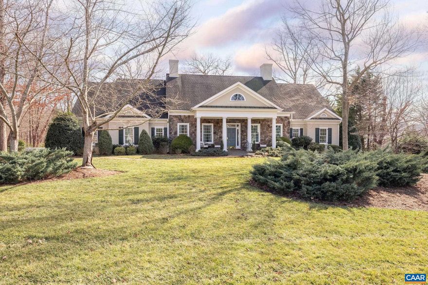 Nestled on a coveted oversized lot along a private street in Glenmore, this custom home offers a perfect blend of elegance and comfort. Recently refreshed, the five-bedroom, four-and-a-half-bath residence sits on nearly an acre of serene property. Step inside to a grand great room, where soaring ceilings and abundant natural light create an inviting atmosphere. A private office overlooks a quiet cul-de-sac, while the spacious dining room is ready to host gatherings of family and friends. The recently updated kitchen is designed for both function and style, offering ample space for cooking, entertaining, and enjoying views of the private backyard. The main-level primary suite features an updated en suite bath, providing the option for effortless one-level living. An additional bedroom with a private bath is also on this floor. Navigate seamlessly between levels via stairs or the convenient elevator. Upstairs, two additional bedrooms accompany an unfinished space, primed for expansion. The terrace level is a haven of versatility, featuring generous entertainment areas, an extra bedroom, and a full bath. Step onto the screened-in porch to take in the tranquil beauty of the expansive yard. As an added bonus, the purchase of this home,Soapstone Counter,Fireplace in Family Room