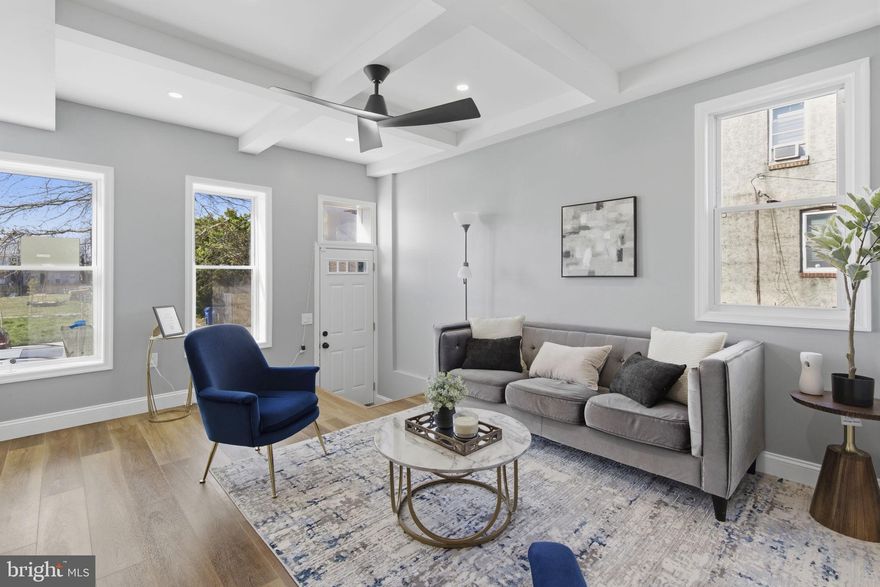 This 3 bedroom, 3.5 bath beauty has been rebuilt from the ground up, delivering a like-new feel with stylish upgrades at every turn.

From the moment you walk in, you’ll notice the bright, open layout paired with sleek flooring and clean, contemporary finishes. The kitchen is a true showstopper . Featuring custom cabinetry, a farmhouse sink, pot filler, and stainless steel appliances designed to impress while still being functional for everyday life.

The main living space offers the perfect balance of comfort and style, complete with a modern electric fireplace that creates an inviting atmosphere all year long. The open staircase adds a unique architectural touch and keeps the home feeling spacious and connected.

Upstairs, retreat to a spacious primary suite with a private bath, along with two additional bedrooms and a full hall bath. The finished basement expands your options with extra living space ideal for a lounge, workspace, or guest area, with the opportunity to easily add a 4th bedroom for even more flexibility.

Step outside to a fully fenced, maintenance-free backyard, perfect for entertaining or unwinding without the hassle of yard work.

Located just minutes from major commuter routes, downtown Baltimore, and local hotspots, this home delivers style, space, and convenience all in one.