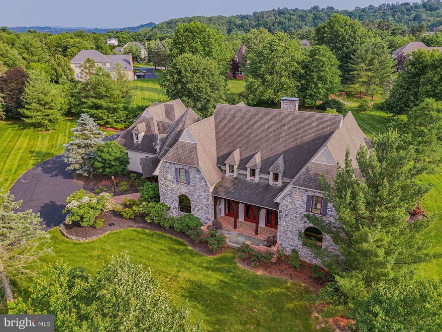 Exceptional Blair Custom Home on the market for the very first time. Attention to detail, timeless finishes and thoughtfully design is evident the moment you step into this home. Nestled on 1.53 acres in the sought-after Parkland School District. This magnificent home offers over 5,800 square feet of living space. Meticulously maintained 4+ bed, 4.5 bath home seamlessly blends quality craftsmanship with everyday comfort. Inside, you’ll find an abundance of natural light streaming through Pella windows and doors, highlighting beautiful hardwood floors that span the main living areas. The Brader custom kitchen features granite countertops, tile backsplash, under-cabinet lighting, island seating, and stainless steel appliances including a built-in convection oven, convection microwave, warming drawer, and a beverage center with wine and drink refrigerators. A charming window seat adds warmth and function to the dining area. Soaring ceilings enhance the open feel of the home, with 10-foot ceilings in the great room, cathedral ceilings in the second-floor rec room and 9-foot ceilings throughout the rest of the home, including the lower level.
The main level also includes a current billiards room or could be fifth bedroom, a full and half bath and a well-designed mudroom with bench seating, locker-style storage and a walk-in closet. Upstairs, you’ll find 3 generously sized bedrooms one with an ensuite bath and all with large closets. Hall bathroom with double vanity and private shower/toilet space, a spacious laundry room with built-ins and utility sink. Bright rec room with cathedral ceilings, built-ins, a window seat and storage perfect for studying, relaxing or creative play. The luxurious owner’s suite is also located on the second floor and offers two sets of French doors leading to a private Trex deck, a custom walk-in closet and a spa-like ensuite bath with a Brader-built double vanity, Jacuzzi tub, walk-in tile shower with bench seating, radiant heated floors and a private water closet. The lower level offers 9-foot ceilings and over 1,000 square feet of open space ideal for a home theater, fitness area or perhaps an indoor pickleball court. Basement is already rough-plumbed for a future bathroom. The home features a three-zone heating and cooling, radiant tile floor heat in the owner’s suite, a security system and a radon system for peace of mind. Step outside to enjoy incredible living space with expansive patios, covered seating areas, a separate BBQ patio, outdoor wood-burning fireplace and a step-in hot tub. A tranquil pond, large flat backyard and side yard are the perfect setting for year round entertainment. The oversized driveway includes a generous flat space ideal for basketball or recreation. Additional features include an attached oversized utility shed and an electronic dog fence. This is a rare opportunity to own a custom home that combines quality, space and style in one of the area’s most desirable locations.