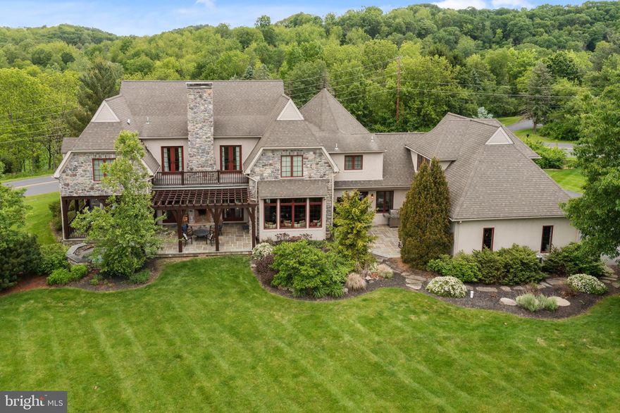 Exceptional Blair Custom Home on the market for the very first time. Attention to detail, timeless finishes and thoughtfully design is evident the moment you step into this home. Nestled on 1.53 acres in the sought-after Parkland School District. This magnificent home offers over 5,800 square feet of living space. Meticulously maintained 4+ bed, 4.5 bath home seamlessly blends quality craftsmanship with everyday comfort. Inside, you’ll find an abundance of natural light streaming through Pella windows and doors, highlighting beautiful hardwood floors that span the main living areas. The Brader custom kitchen features granite countertops, tile backsplash, under-cabinet lighting, island seating, and stainless steel appliances including a built-in convection oven, convection microwave, warming drawer, and a beverage center with wine and drink refrigerators. A charming window seat adds warmth and function to the dining area. Soaring ceilings enhance the open feel of the home, with 10-foot ceilings in the great room, cathedral ceilings in the second-floor rec room and 9-foot ceilings throughout the rest of the home, including the lower level.
The main level also includes a current billiards room or could be fifth bedroom, a full and half bath and a well-designed mudroom with bench seating, locker-style storage and a walk-in closet. Upstairs, you’ll find 3 generously sized bedrooms one with an ensuite bath and all with large closets. Hall bathroom with double vanity and private shower/toilet space, a spacious laundry room with built-ins and utility sink. Bright rec room with cathedral ceilings, built-ins, a window seat and storage perfect for studying, relaxing or creative play. The luxurious owner’s suite is also located on the second floor and offers two sets of French doors leading to a private Trex deck, a custom walk-in closet and a spa-like ensuite bath with a Brader-built double vanity, Jacuzzi tub, walk-in tile shower with bench seating, radiant heated floors and a private water closet. The lower level offers 9-foot ceilings and over 1,000 square feet of open space ideal for a home theater, fitness area or perhaps an indoor pickleball court. Basement is already rough-plumbed for a future bathroom. The home features a three-zone heating and cooling, radiant tile floor heat in the owner’s suite, a security system and a radon system for peace of mind. Step outside to enjoy incredible living space with expansive patios, covered seating areas, a separate BBQ patio, outdoor wood-burning fireplace and a step-in hot tub. A tranquil pond, large flat backyard and side yard are the perfect setting for year round entertainment. The oversized driveway includes a generous flat space ideal for basketball or recreation. Additional features include an attached oversized utility shed and an electronic dog fence. This is a rare opportunity to own a custom home that combines quality, space and style in one of the area’s most desirable locations.