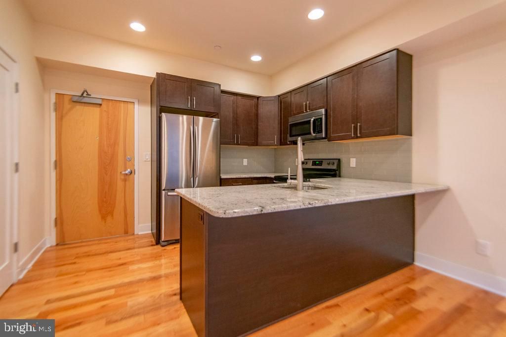 Photo of 1242 Point Breeze Avenue #UNIT 303, PHILADELPHIA, PA 19146 (MLS # PAPH2510352)