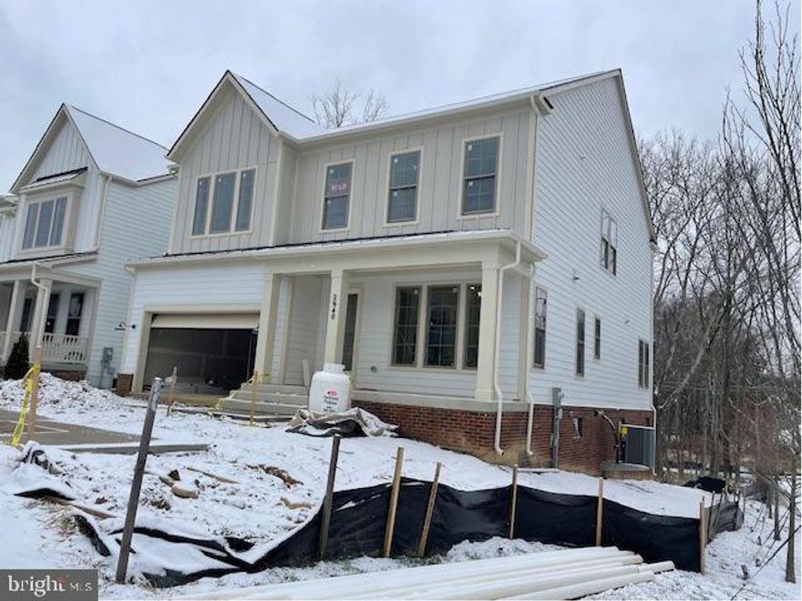 **Limited time $20,000 towards closing cost using Preferred Lender.** Only 2 Home-sites Remain here at Fairfax Landing.  This Bentley Model is now under construction.  Will be a January 2024 Delivery.  End Unit with lots of Sunshine and abutting woods.  A Rare walk out basement condition with Finished LL Rec. Room and Full bath.  This model has 5 Bedrooms and 6 Full Baths . One of the Bedrooms are on the first floor with a Full Bath. This farmhouse-style home, with stately 10ft. ceilings on main level. A Large size Dining Room with plenty of Pantry Space. On the 2nd level, the grand owner’s suite is made even more luxurious with its two large walk-in closets and spa like bathroom, complete with a deluxe soaking standalone tub! Gourmet Kitchen with Quartz and Stainless Steel Appliance.  Hardwood throughout the main level and Oak Steps.  Fairfax Landing offers, gorgeous walking trails, Tot lot and a Pond with a brand new Dock.  Having a Community Urban feel, while centrally located between Vienna Metro and downtown Mosaic district one mile in both directions.  Best of both worlds, in a one of kind Community.  Do not miss this opportunity and come schedule a Bentley Tour.