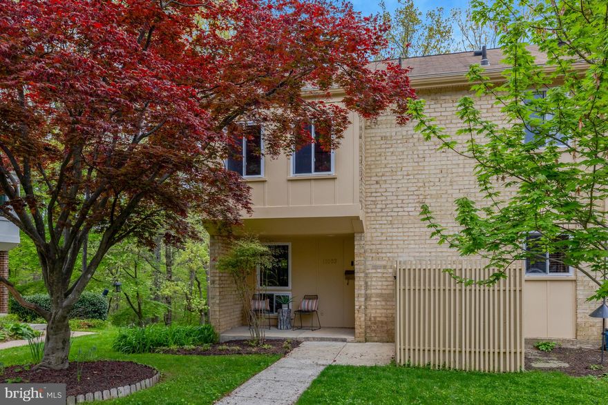 Welcome to 11063 Saffold Way, a spacious end-unit townhome in the desirable Hillcrest Cluster of Reston. This four-bedroom, three-and-a-half-bath home offers a smart and functional layout across three finished levels. Hardwood floors run throughout both the main and upper levels. The upper level features a generous primary suite and two additional bedrooms. The main level features a bright and spacious living room with access to the deck, a separate dining room, an updated kitchen, and a convenient half-bath. The lower level provides a large recreation room with a gas fireplace and walkout access to the patio, as well as a fourth bedroom, full bath, and a utility room with washer, dryer, and ample storage space. Additional features include pull-down attic stairs with flooring for extra storage and a private, wooded setting that creates a peaceful outdoor retreat. Hillcrest Cluster offers ample parking, and as part of Reston Association, residents enjoy access to a wide range of amenities, including pools, tennis courts, and miles of trails. The home is ideally located near the Uplands Recreation Center, Lake Anne, Reston Town Center, and Lake Fairfax Park. Key updates include fresh interior paint (2025), roof (2018), water heater (2019), HVAC (2019), lower level bathroom renovation (2022), electrical updates, all windows and doors replaced, and refreshed kitchen and baths. This home is move-in ready, offering both space and convenience in a highly sought-after location.