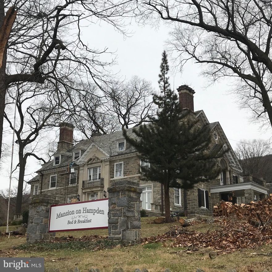 "The Mansion on Hampden" is a Gorgeous Estate / Bed & Breakfast (formerly an Assisted Living Facility) built in 1934 with 26,000 +/- SF.  The property features 45 total rooms, including grand Living Room, Office & Dining Room on 1st floor; Approved for 8 B&B rooms; Third floor staff quarters; 20 Baths; Partially finished Lower Level & Laundry Room; Elevator, 3 phase electric, Generator, Vermont Slate Roof, Patio, Covered Patio & Parking Lot on 3+ Acres!