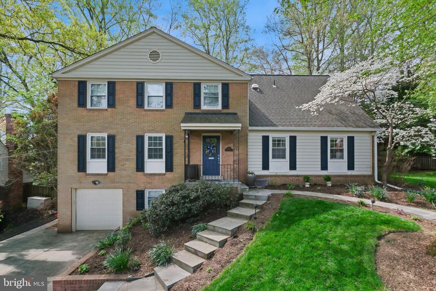 Experience the perfect blend of modern upgrades and classic comfort in this meticulously maintained residence featuring five versatile bedrooms and two and a half baths.

The main level welcomes you with gleaming hardwood floors that flow seamlessly through an expansive formal living room and grand dining room, offering ample space for both quiet relaxation and larger gatherings. An inviting family room sits just off the kitchen, anchored by a cozy wood-burning fireplace. At the heart of the home, the updated eat-in kitchen features sleek stainless steel appliances, recessed lighting, a dedicated pantry, and a built-in wine fridge for effortless entertaining. This level is completed by a convenient half bath and a flexible main-level bedroom, ideal for guests or a home office.

Indoor-outdoor living flows seamlessly, with new sliding glass doors opening to a private backyard oasis. This fully fenced retreat is framed by lush greenery and vibrant blooms, creating a serene backdrop. A heated pool and spa with a built-in hot tub anchor the space, offering a true resort-style setting for both entertaining and everyday enjoyment.

Upstairs, the expansive primary suite features a unique layout with an attached room, currently styled as a custom walk-in closet, that is easily convertible to a nursery or an additional bedroom. Three additional bedrooms share an updated hall bath with double vanities and modern finishes. The finished lower level provides generous additional living space with durable LVP flooring, a practical kitchenette, a dedicated workroom, and a large laundry area with storage.

Superior peace of mind is ensured with extensive recent exterior and interior updates, including a newer roof, siding, HVAC, garage door, and energy-efficient windows. Complete with a one-car garage and set in a sought-after neighborhood, this home is truly move-in ready.

This home is moments from Tilden Woods Park, Tilden Woods Pool, and North Farm Pool. Commuters will appreciate the rapid access to I-270, I-495, and the North Bethesda Metro Station. With Pike & Rose, Montgomery Mall, and the Strathmore Music Center just minutes away, premier dining, shopping, and entertainment are always close at hand.