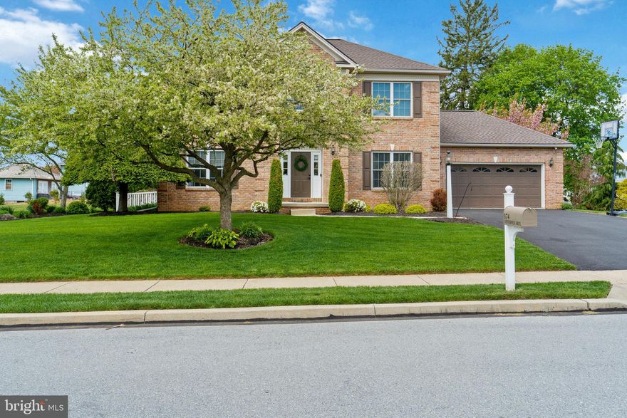 Beautifully maintained and truly move-in ready, this 5 bedroom, 3.5 bath single-family home is located in the highly desirable Stone Knoll subdivision of South Londonderry Township, within the Palmyra School District.

The home features a welcoming foyer along with a formal dining room complete with wood-look ceramic tile flooring, crown molding, and chair rail. A versatile front room offers the perfect space for a home office or formal living area.

The heart of the home is the open-concept family room and kitchen, ideal for both everyday living and entertaining. The family room showcases a beautiful stone veneer gas fireplace, while the kitchen is thoughtfully updated with shaker-style cabinetry, quartz countertops, slate gray stainless steel appliances—including a double oven and French door refrigerator—and a separate informal dining area. A convenient main-level laundry room adds to the functionality.

Upstairs, you’ll find all five bedrooms, including a spacious primary suite complete with three closets and a private bath featuring a large soaking tub, dual vanity, and walk-in shower. The additional bedrooms are generously sized, with one currently used as an office, and share an updated hall bathroom.

The finished lower level is built for entertaining, offering a large recreation space with a second gas fireplace, custom built-ins, and a wet bar with ample seating and hookups for two beverage coolers, along with a third full bathroom.

Step outside to enjoy the large, level, fully fenced backyard. The deck is perfect for relaxing or hosting, with a partially covered permanent roof and a stylish sun shade over the remaining area. A fire pit area and storage shed complete the outdoor space.

Additional highlights include wood-look ceramic tile flooring, all new carpet, fresh paint throughout, and a roof replaced in 2022.

This is a home you truly have to see to appreciate.
