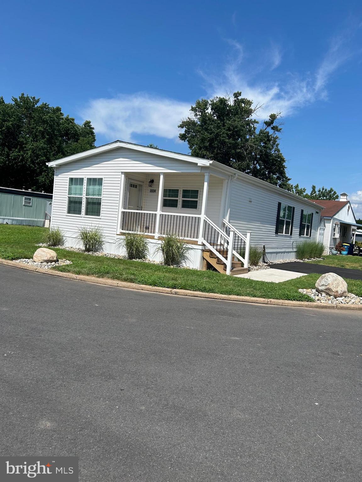 This is not your ordinary manufactured home!
Extensive attention to detail was the priority for this new 2025 Hudson double wide home. Professional solid foundation. Interior upgrades enhance the counters and appliances in the kitchen and baths. Extra windows are added to provide more natural light. Anderson storm doors. New carpeting. Ceiling fans. Newly paved driveway. Professional landscaping and hardscaping, including river rocks and boulders. Custom Amish shed.
Note: This home is designed for 3 bedrooms, but the owner opted to convert it to 2 bedrooms. Original floor plan is available.
Large custom Amish shed.
Enjoy the immaculate condition of this home.
