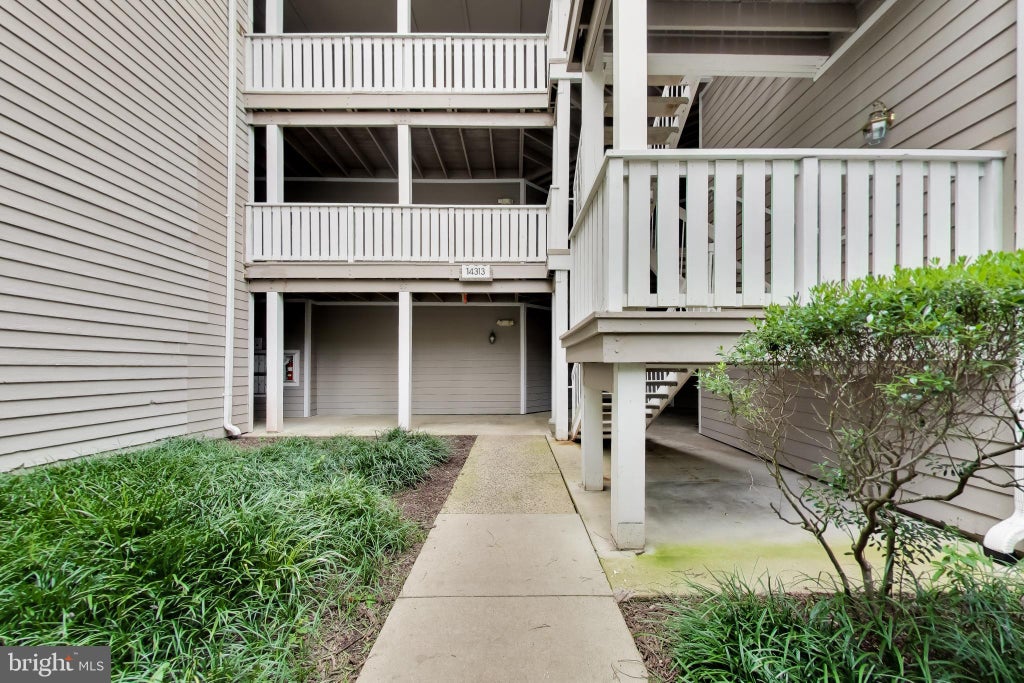 Photo of 14313 Climbing Rose Way #106, CENTREVILLE, VA 20121 (MLS # VAFX2344416)