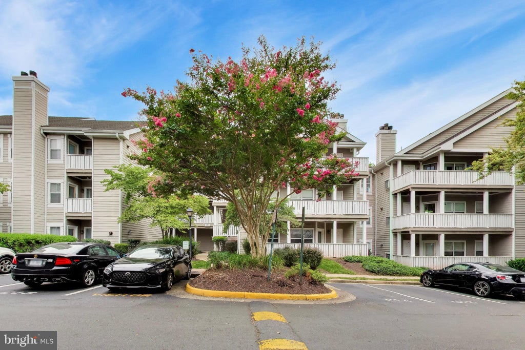 Photo of 14313 Climbing Rose Way #106, CENTREVILLE, VA 20121 (MLS # VAFX2344416)