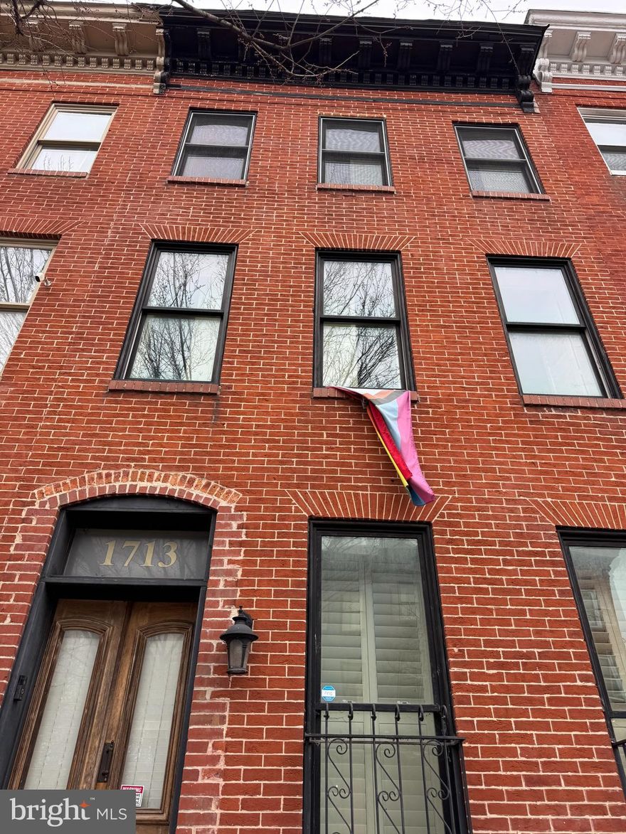 Discover an exceptional investment opportunity in the heart of Hollins Market! This interior row townhouse with solid red brick construction is the timeless design in the neighborhood. This property is poised for significant appreciation. Step inside to find an inviting open floor plan that maximizes space and natural light. The wood floors add warmth and character, while the eat-in kitchen, equipped with essential appliances like a dishwasher and refrigerator. The dining area seamlessly connects to the living space, creating an ideal environment for entertaining or relaxing. The upper floor laundry adds convenience, making this property attractive to potential renters or future homeowners. The poured concrete floor in basement offers additional storage. Located less than a mile from public transportation, this townhouse is strategically positioned for easy access to the vibrant community of Hollins Market, known for its shops and dining options. With ample on-street parking available, this property is not only a comfortable residence but also a smart investment in a growing area. Seize this opportunity to own a piece of history with modern amenities, and watch your investment flourish in a desirable neighborhood!