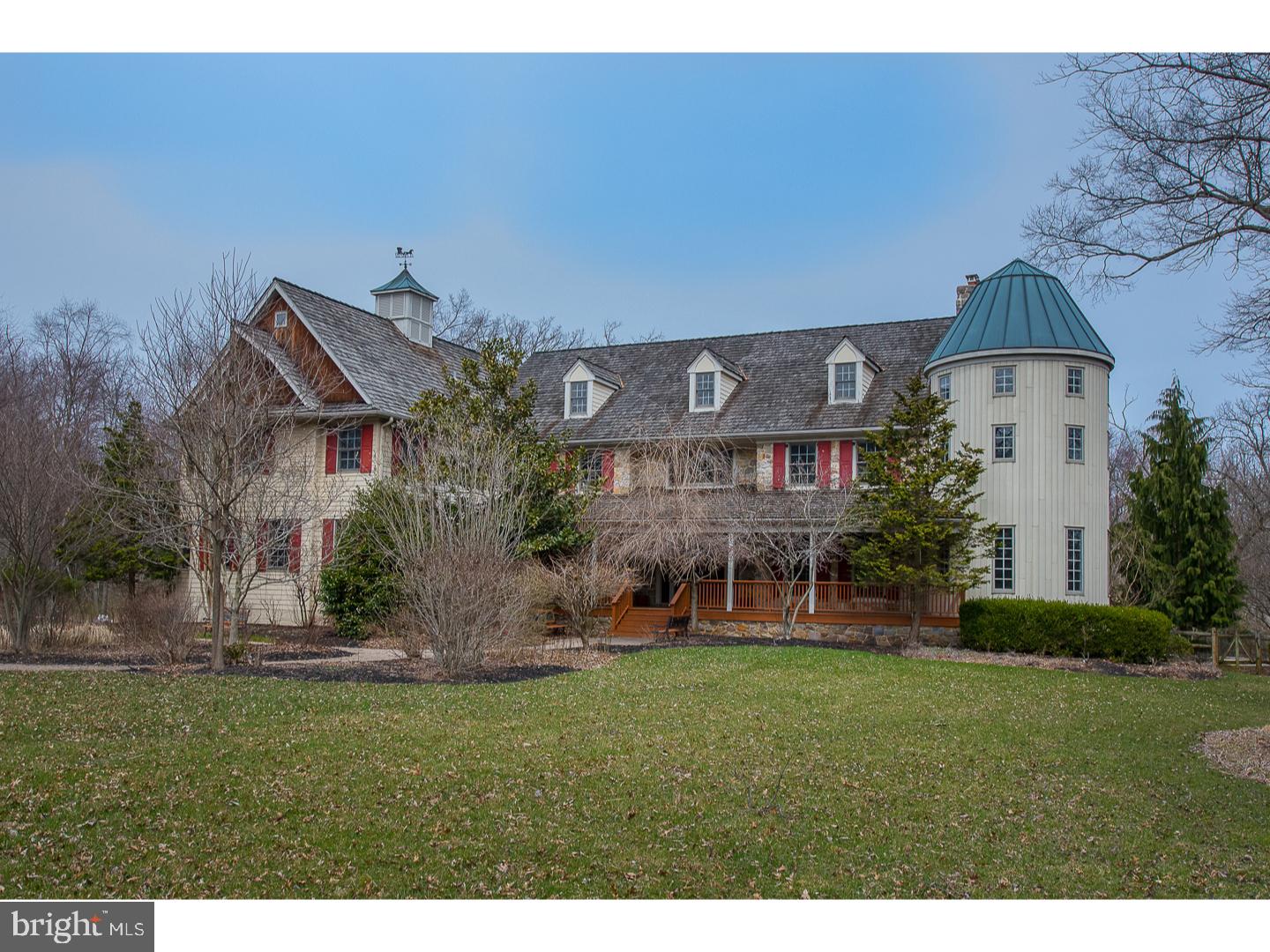 INCREDIBLE PRICE / OUTSTANDING VALUE. Magnificent Country Estate in the heart of desirable Radnor Hunt at a fabulous price! 6 Bedrooms/6 baths. Nearly 10,000 sq ft of living space and 8+ acres of wonderful privacy, yet within a terrific community. No features have been spared in the highly detailed home with 9' ceilings, deep crown and base moldings, numerous built in cabinetry and mill work finishes, finished on-site hardwood flooring, and much more. Formal entrance with marble floor and turned staircase, large yet cozy living room with f/p leading to an office and sun porch. Large formal dining rm with tray ceiling and butler's pantry. Kitchen is a gourmet's delight with professional appliances, large center island, custom cabinetry and pantry. The family room boasts a dramatic 24' high ceiling with wood burning f/p finished with beautiful floor to ceiling field stone surround, and 3 sides of windows from floor to ceiling. There is also a wonderful library/study that has a f/p with marble surround and decorative wood mantle. The mud room and two powder rooms are on the main floor. There are numerous access points to the large rear deck overlooking pool and grounds, and inside access to the oversized 3 car garage. The second floor includes 5 bedrooms, including the very opulent master suite, all with en-suite baths. There is also an office/hobby rm space on this level as well as the laundry rm . There is a front and rear staircase to the finished 3rd level of approximately 2000sq ft. The lower level has numerous rooms including a media/great room, bedroom/office, wine cellar with tasting room, work out room, full bath and walk out to rear yard/pool/entertainment areas. The exterior has two barn-like structures and a dog run area. Award winning Great Valley school and nearby numerous private academes. A short commute to Phila and Airport. Don't miss this special retreat in popular Willistown Twp.