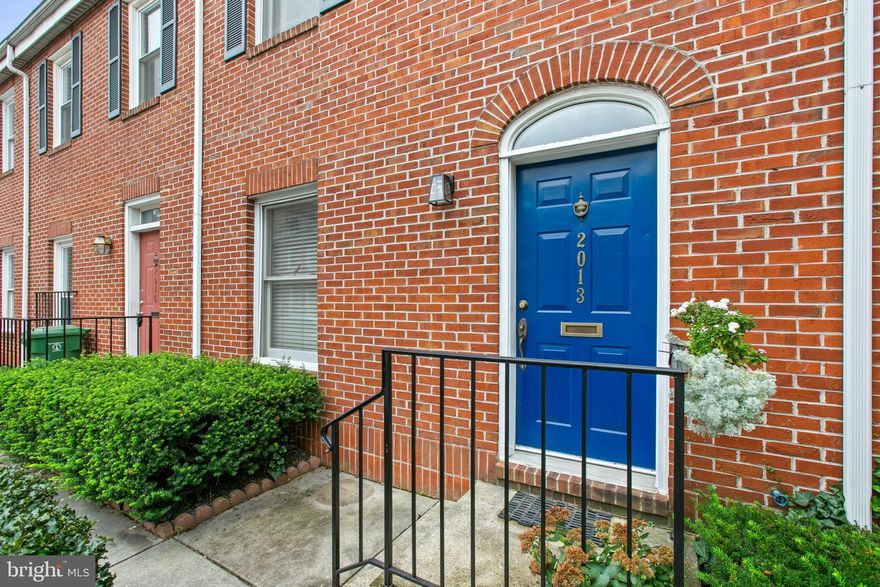 This 18 foot wide brick townhouse is situated in an incredible location!  With a walkability score of 10 you cannot beat it.  Enjoy the easy access to all that  Fells Point-Canton-Harbor East and Patterson Park have to offer without moving your car from your private parking space! This beautiful home has 3 stories with over 1200 sq. feet of living space. The layout is sure to please most buyers and the space can be flexible for living in today's world. Need dedicated parking- a home office-guest room-3rd bedroom-family room? You got it here. The open main level has a 1st floor powder room, dining area, kitchen and sunken living room with sliders that lead to a private rear brick paved patio.  All hardwood flooring except for the warm carpet in the living area. The kitchen has white cabinetry and black granite counter tops. The efficient layout provides plenty of storage space and work areas. The kitchen opens to the dining area for easy entertaining.  Ascend the beautiful wood staircase to the 2nd level that has the Primary bedroom and bath, hall bath, 2nd bedroom and a laundry area. The Primary bedroom with an adjacent bath is in the rear for the utmost privacy. The large Primary bath has a double vanity, separate shower and a whirlpool tub. The 2nd bedroom is in the front of the house and both bedrooms have an abundance of closet space. The 3rd level is an open light filled loft that opens to a wonderful deck! It is currently set up as a 3rd bedroom. Use this space as a den-family room-home office-man cave etc. There is a wet bar and attic storage space as well. Enjoy entertaining or morning coffee out on the Trex deck. With the great location, spacious layout, parking, the rear patio and outdoor deck this  is sure to make a wonderful home for the next buyer! This home is in move in condition yet value priced to allow for the new owner to make updates as needed.